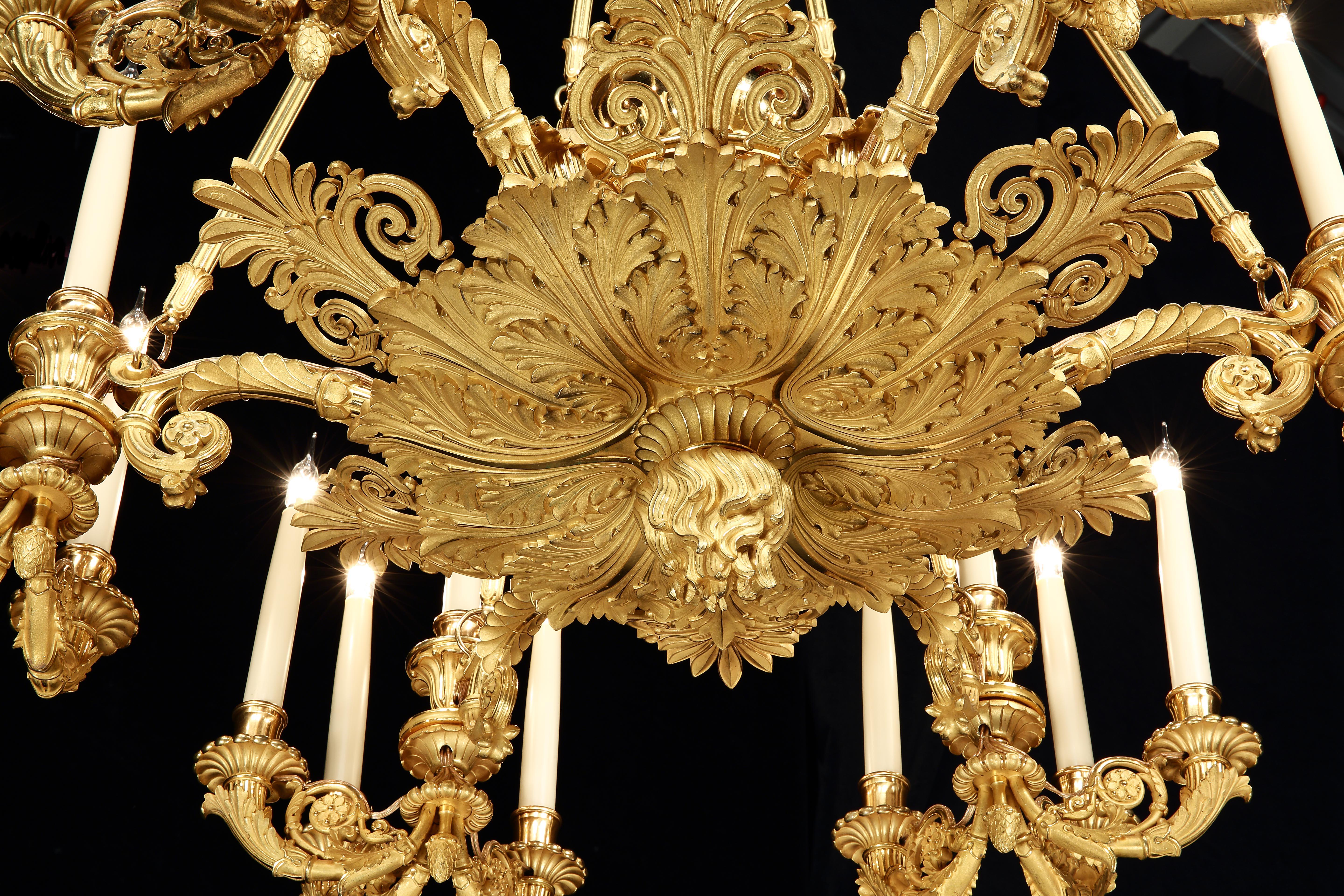 A magnificent Bourbon restoration period
Twenty-four light ormolu chandelier

Constructed in bronze, which has been cast with extraordinary attention to detail, and conformingly excellent planishing, burnishing, and two color mercury gilding; the