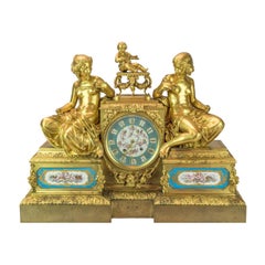 Französische Bourdin-Manteluhr aus Goldbronze mit Figur, um 1890