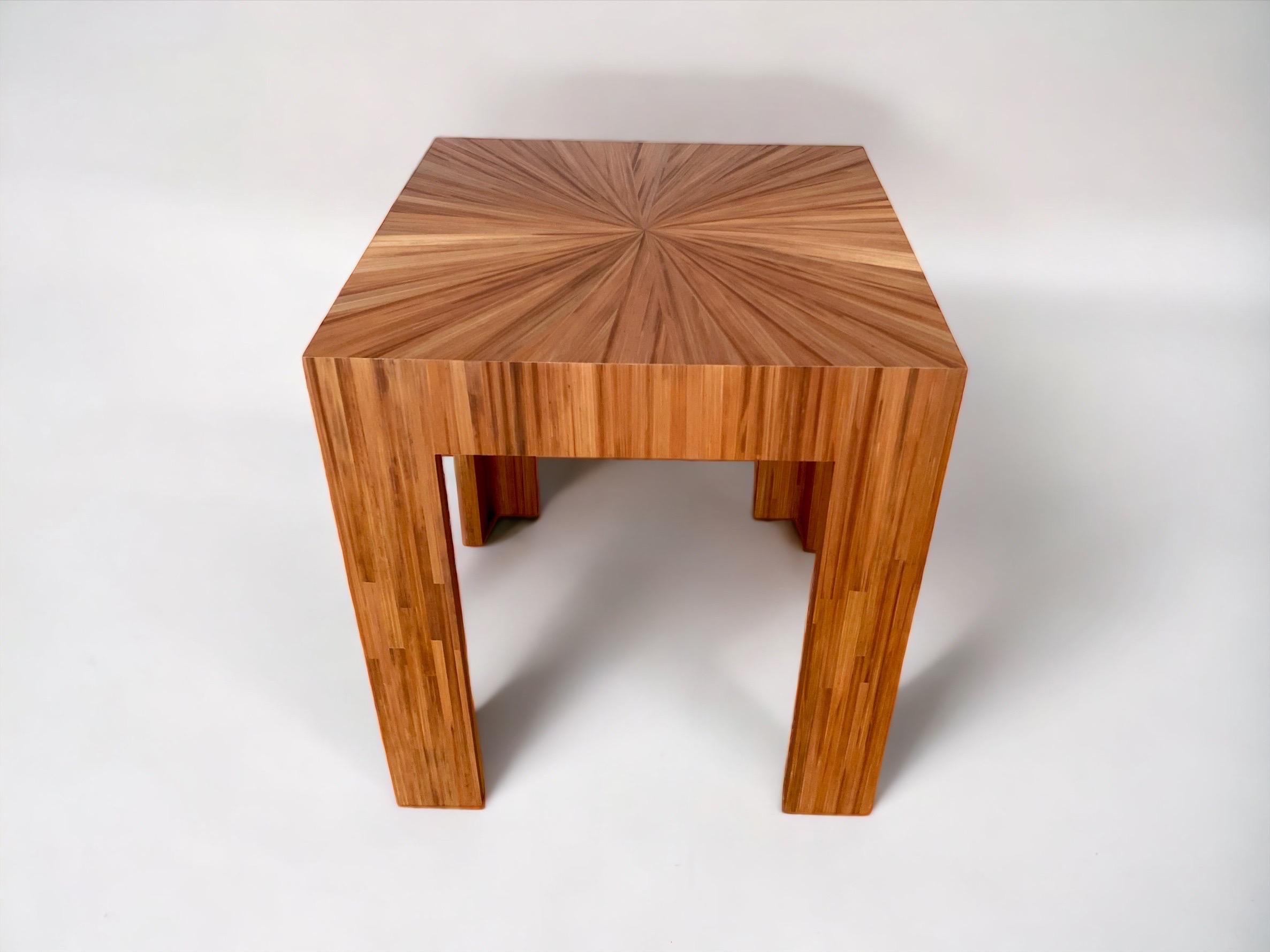 Jean-Michel Frank designs are prized for their serene and simple beauty. Available in more than 60 colors in straw marquetry motif, this striking side table showcases the nuanced hues and textures achieved through Frank’s precision in technique and