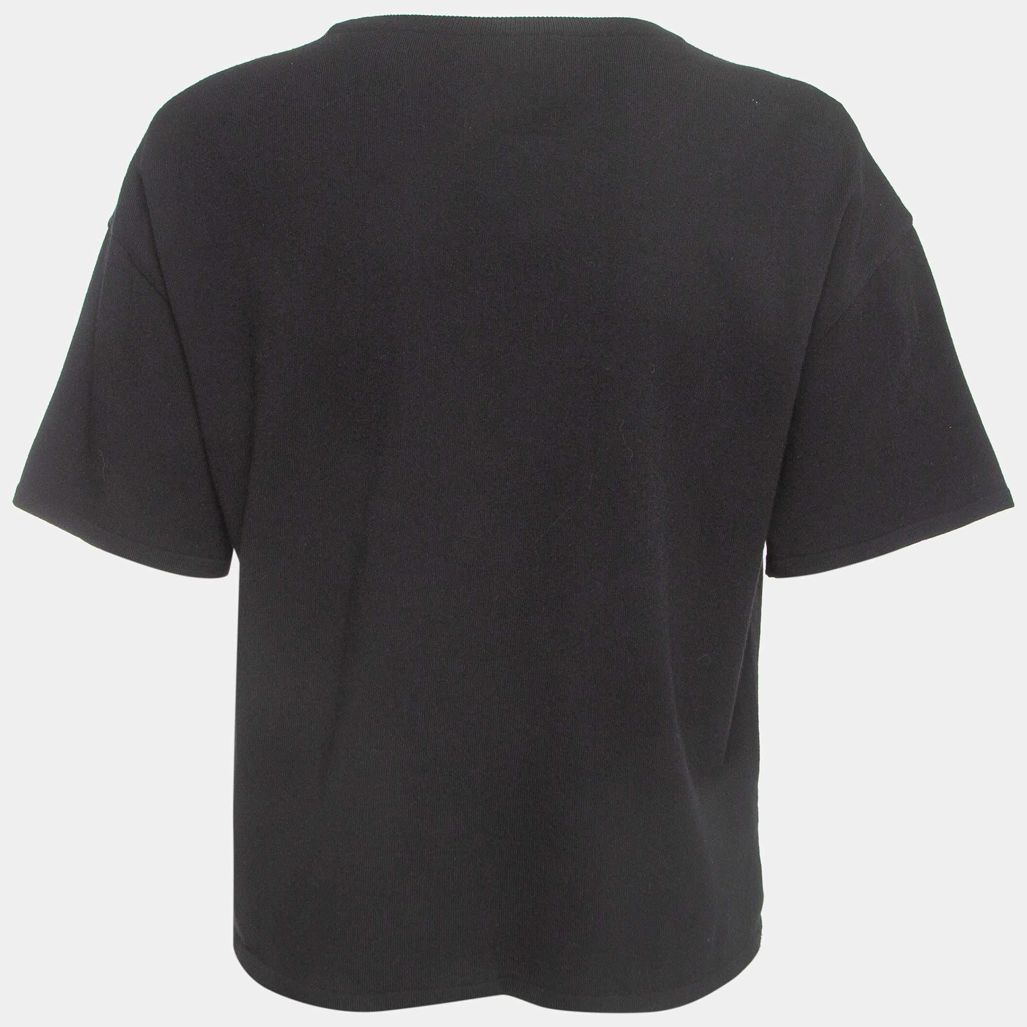 Este top de Boutique Moschino te aportará estilo y comodidad. Confeccionada con el mejor tejido, la creación lleva un ribete de encaje en la parte delantera. Combínalo con una falda y tacones.
