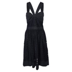 Boutique Moschino Schwarzes Kleid mit gerafftem Ausschnitt aus Spitze M