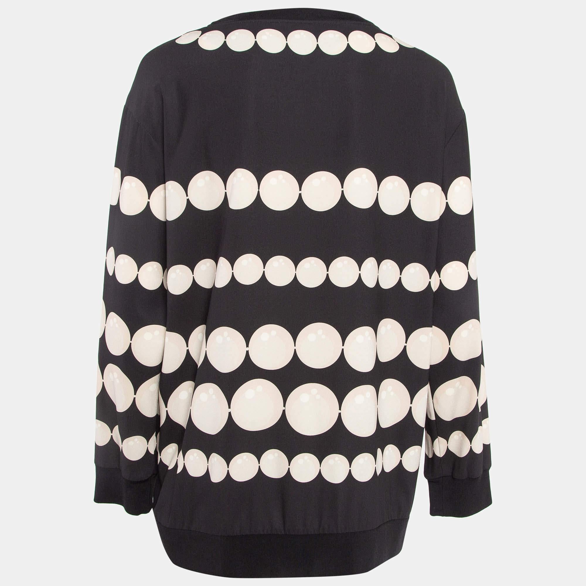 Découvrez l'incarnation du chic douillet avec ce sweat-shirt Boutique Moschino pour femme. Conçue pour la chaleur et le style, elle allie confort et détails à la pointe de la mode, ce qui en fait votre choix de prédilection pour une sophistication