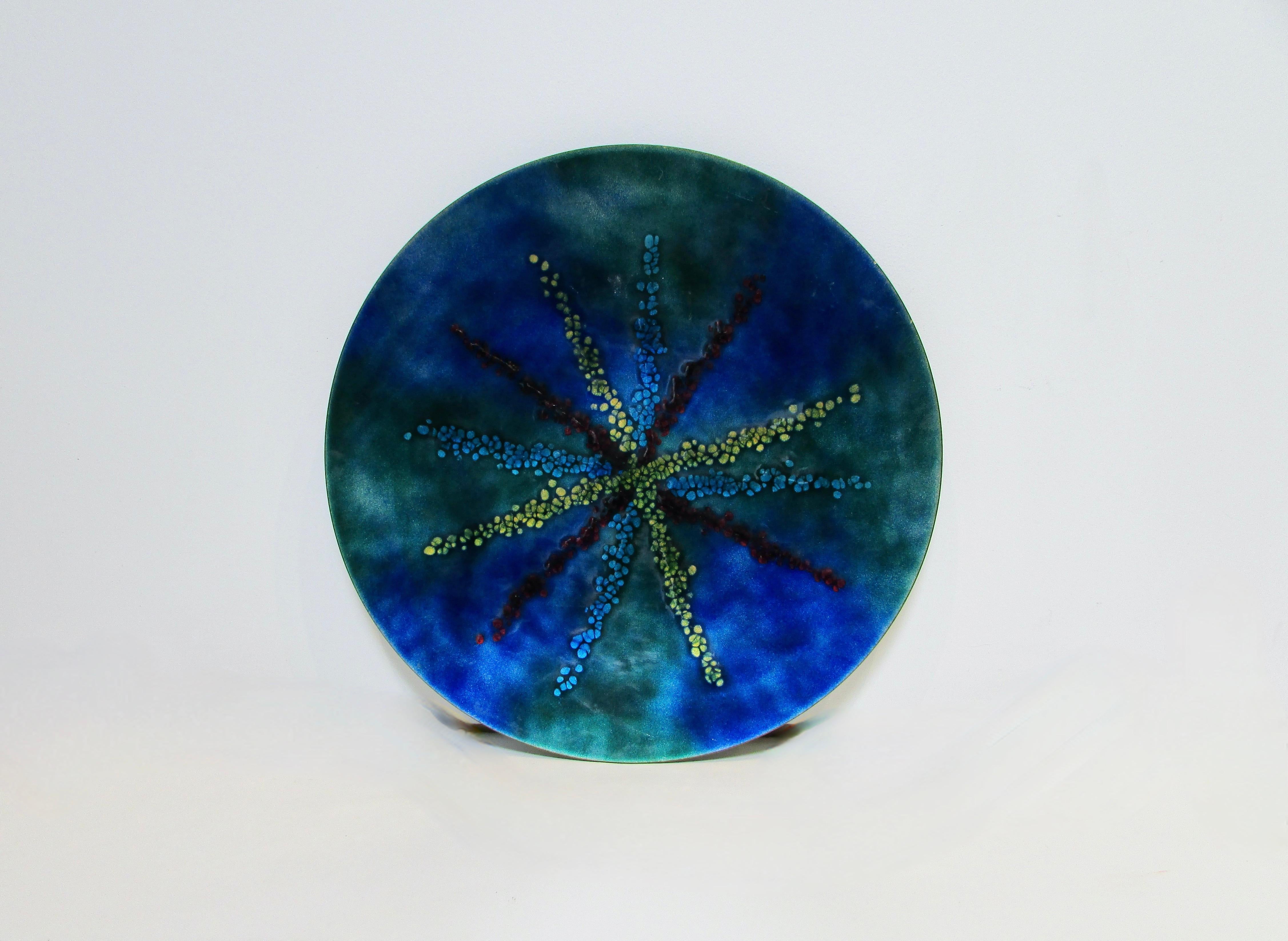 Large size Bovine serving tray or charger . Fused glass on copper . 
The history of Bovano of Cheshire began in 1952, when artist Jim Bower began experimenting with powdered glass fused to small copper plates in the basement of his home in Cheshire,