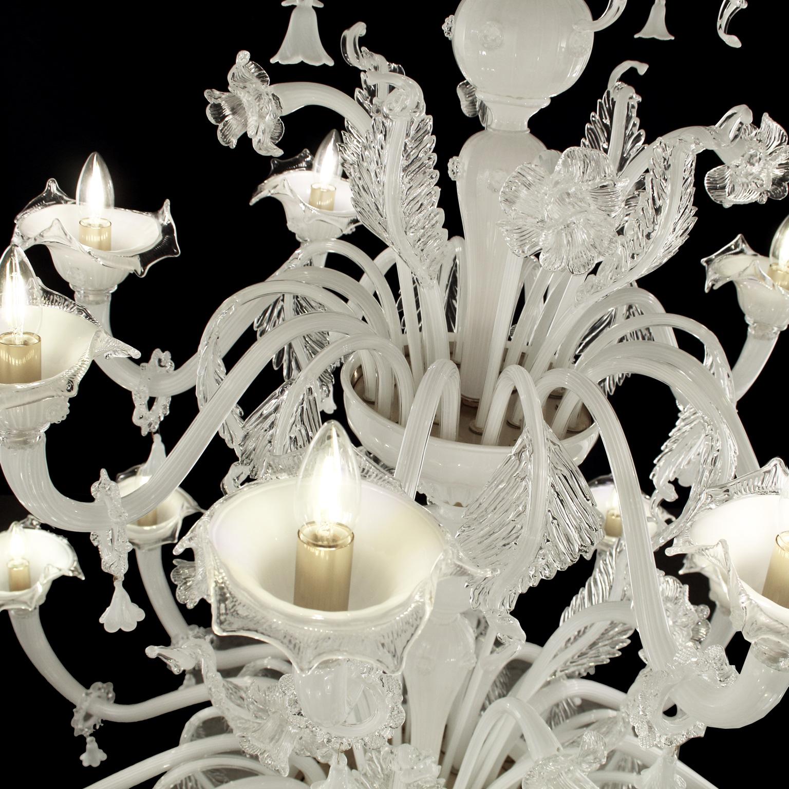 Bovary chandelier, 16+8+4 lights, in encased white Murano glass by Multiforme is a luxury chandelier that will never be outmoded.

Bovary: a collection of handmade blown glass chandeliers and lamps which takes inspiration from the Classic floral