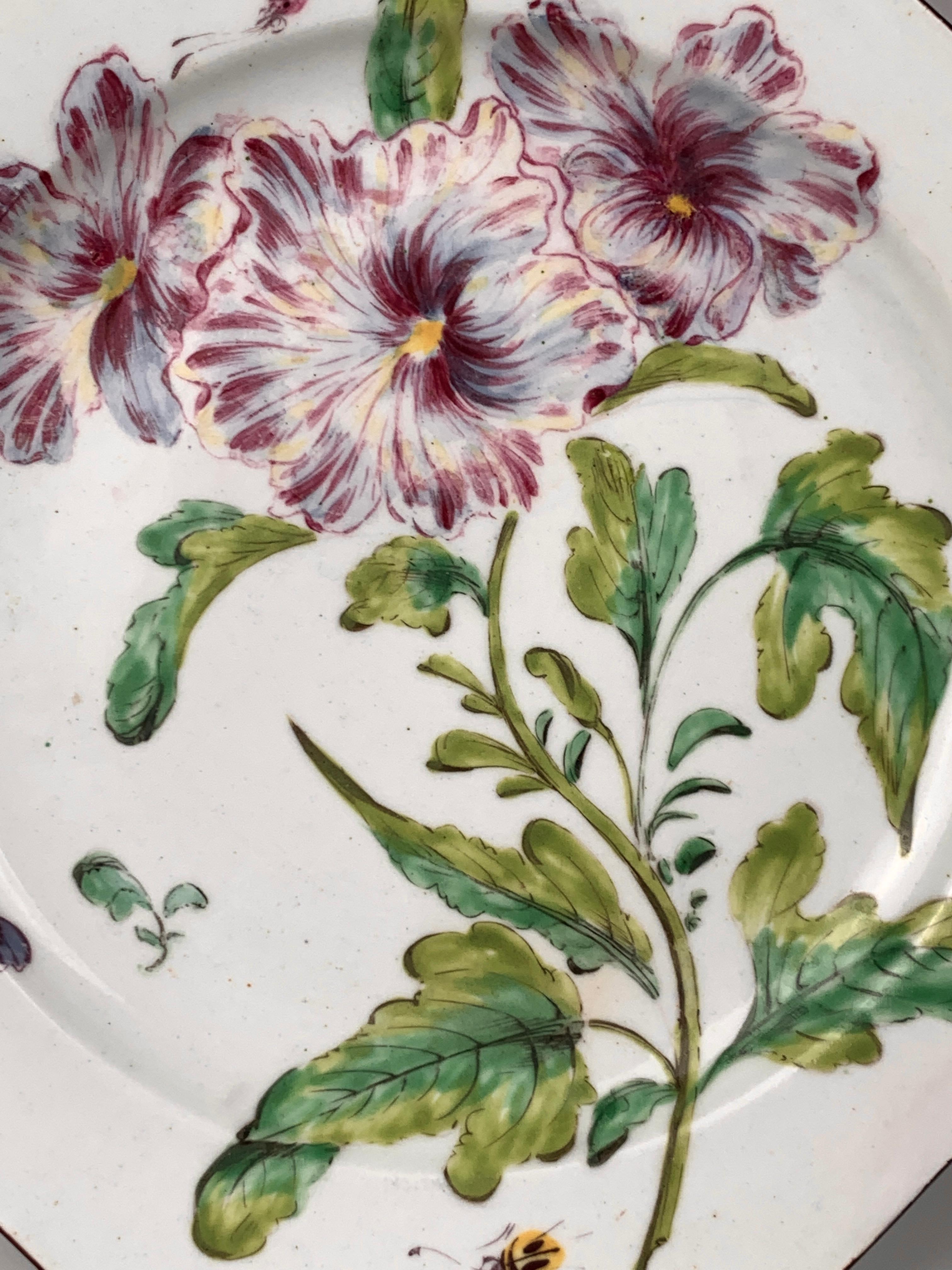 Why we love it: Look at the flower!
This rare Bow porcelain botanical plate was hand-painted in England circa 1760. The exuberant flower painting is still fresh and exciting today. The fully-painted center shows an exquisite flowering hibiscus.