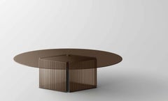 BOW Bronze Oval Glass Dining Table with Fused Glass Base, Made in Italy.