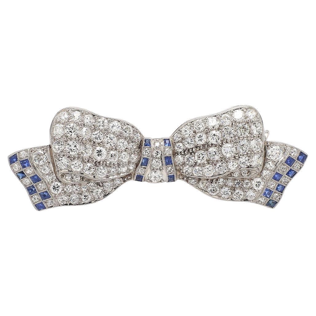 Bow Brooch with French and Euro-Cut Diamonds For Sale