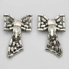 Bow Design Silver Plated Clip On Earrings with Clear and Mid Blue Rhinestones