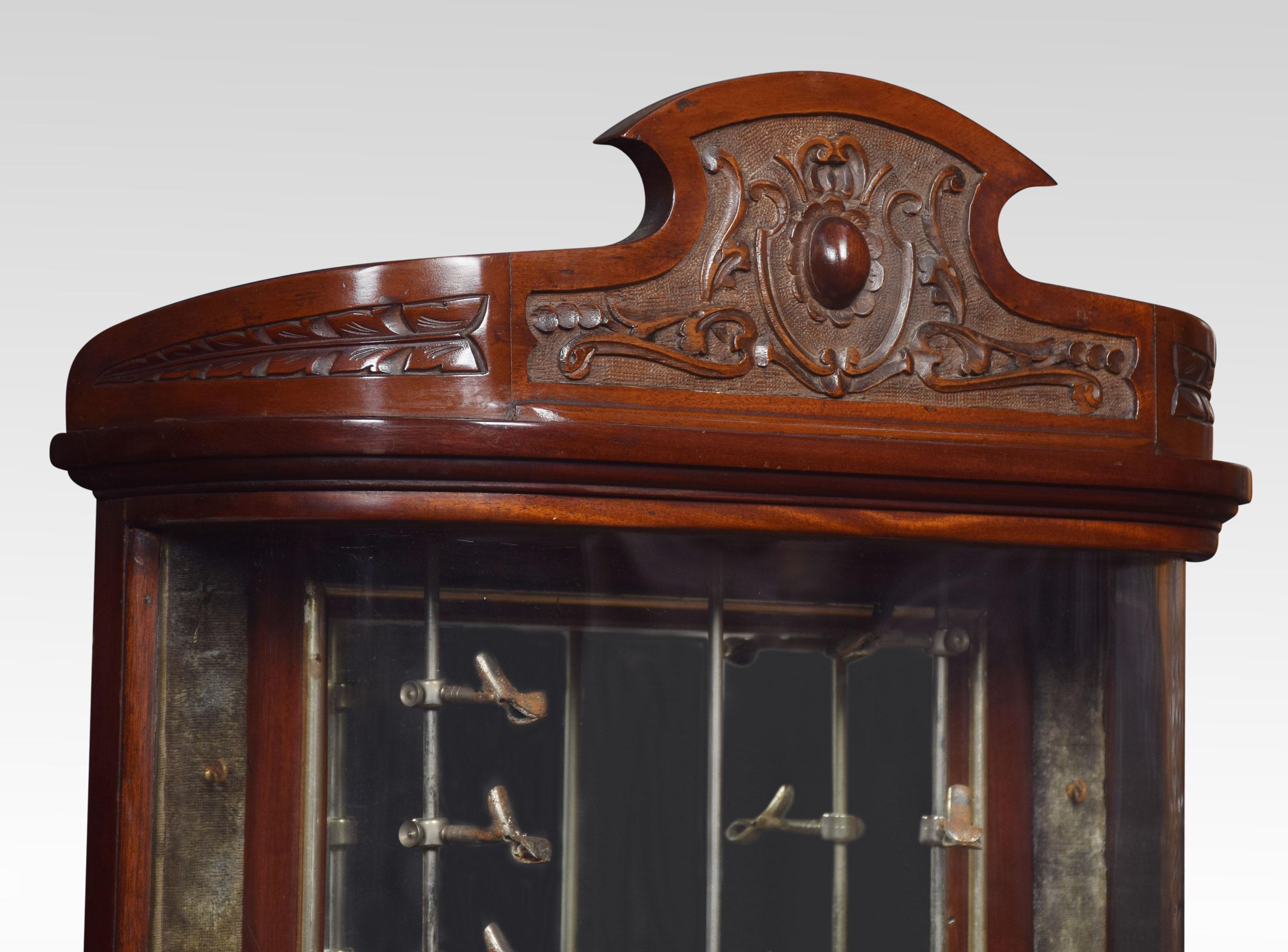 Bow fronted glass pipe cabinet the shaped top with carved detail above bow fronted glazed display case with adjustable pipe holders all raised up on plinth base.
Dimensions:
Height 32.5 inches
Width 21.5 inches
Depth 19.5 inches.