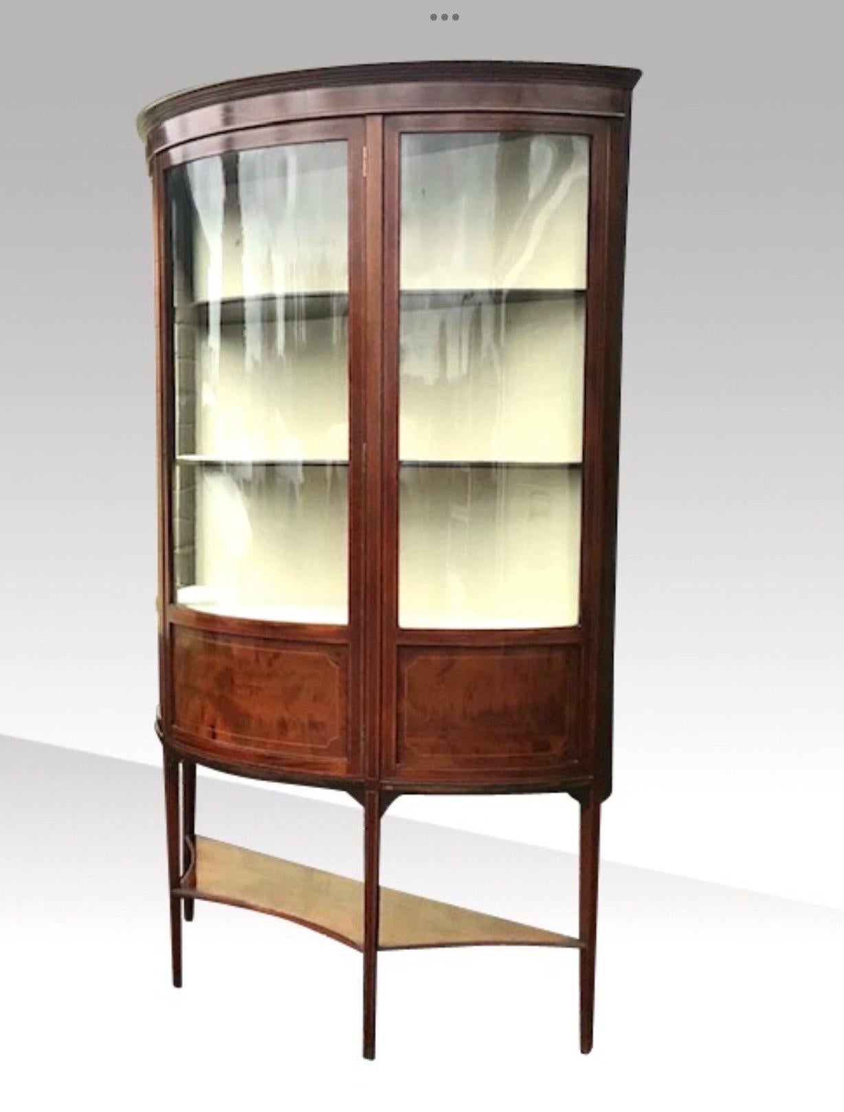 Lovely Bow Fronted Inlaid Mahogany Antique Display Cabinet Vitrine by Maple and Co
c1890
Measures: 72ins x 48ins wide.