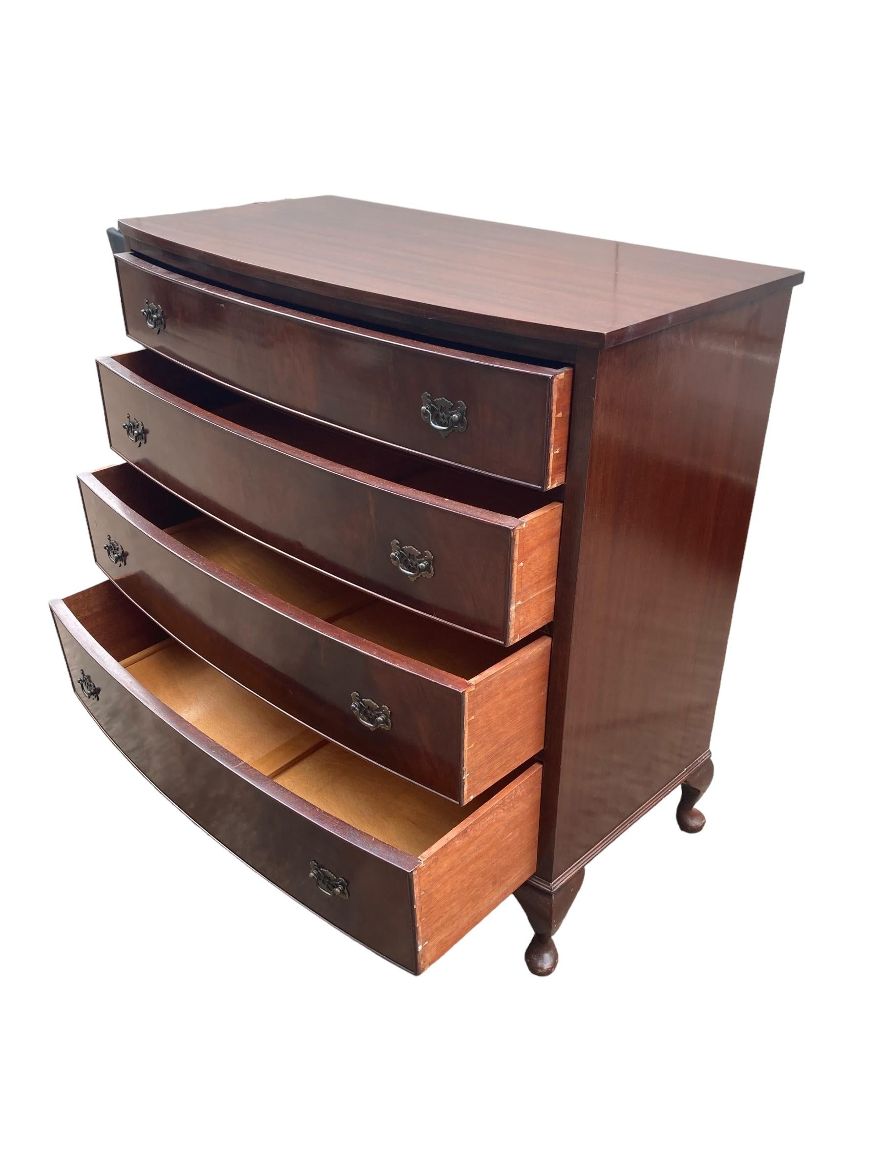 Bow fronted Mahogany Chest of 4 graduated drawers 1