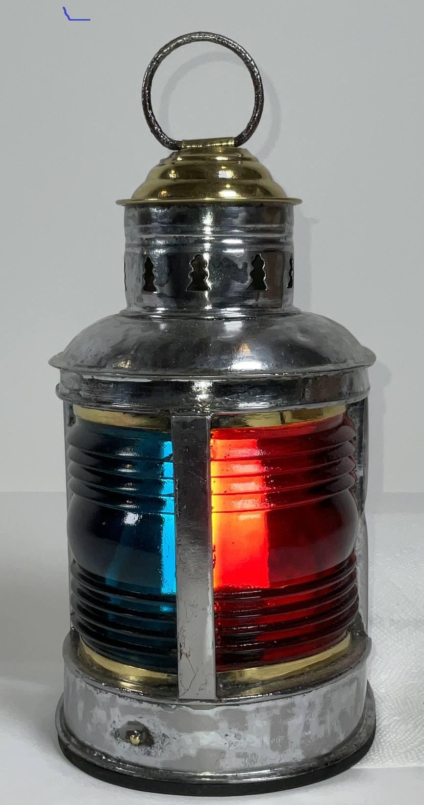 Boat lantern with steel case port and starboard fresnel lenses. Brass cap. Rewired for home use. 9