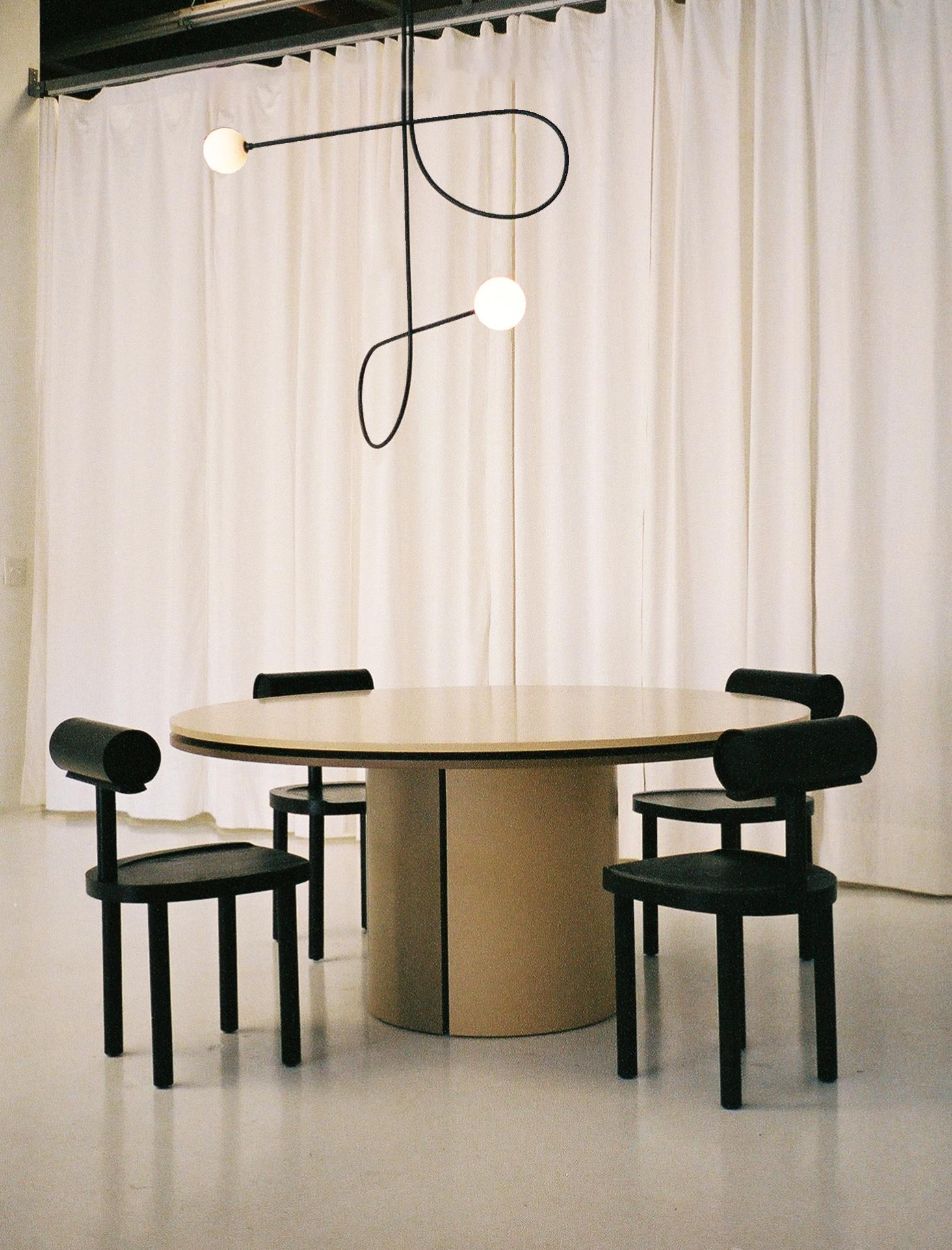 American Bow Pendant Light in Blackened Steel and Hand Blown Glass by Estudio Persona For Sale