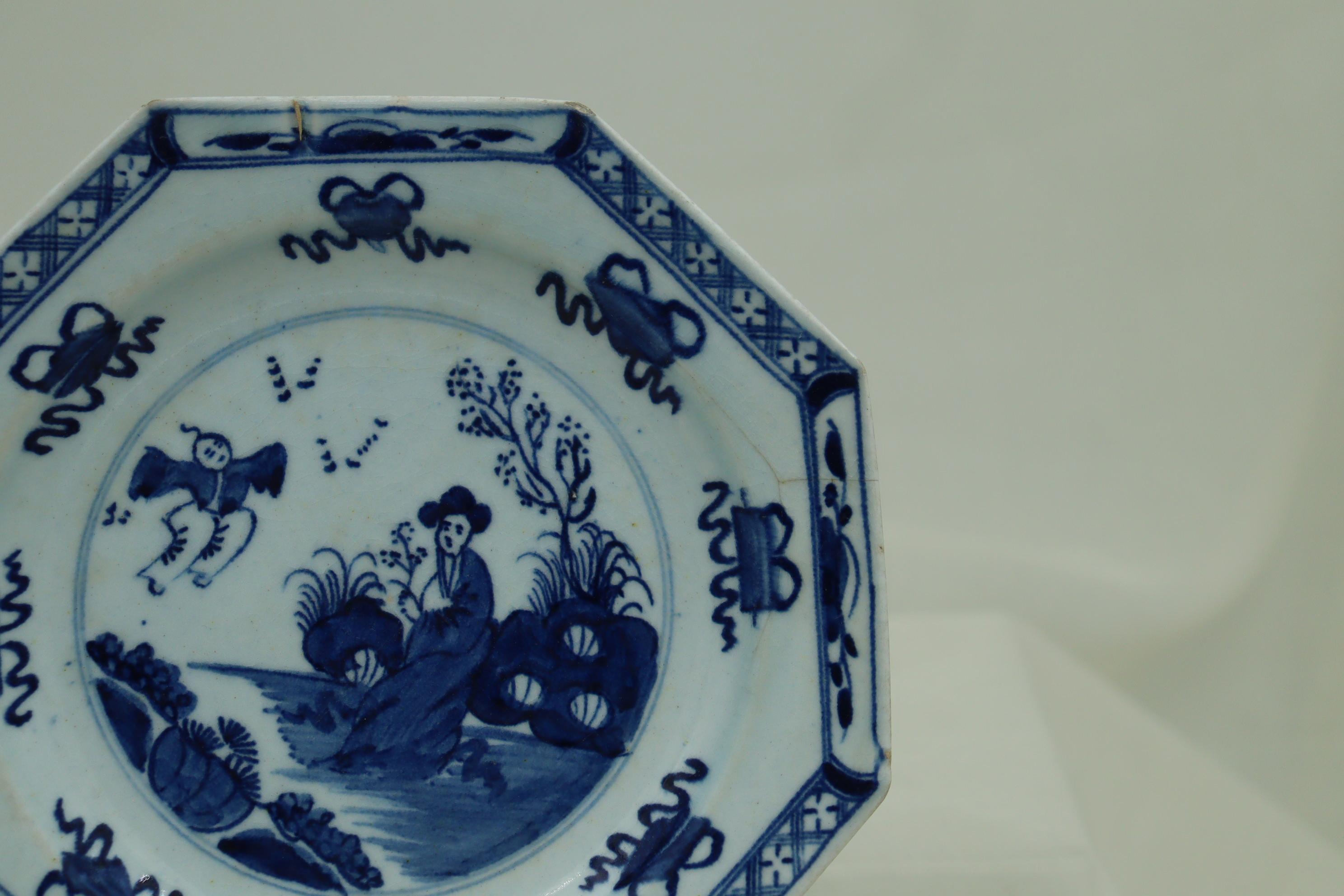 This early Bow octagonal plate is decorated with the hand painted, underglaze blue 