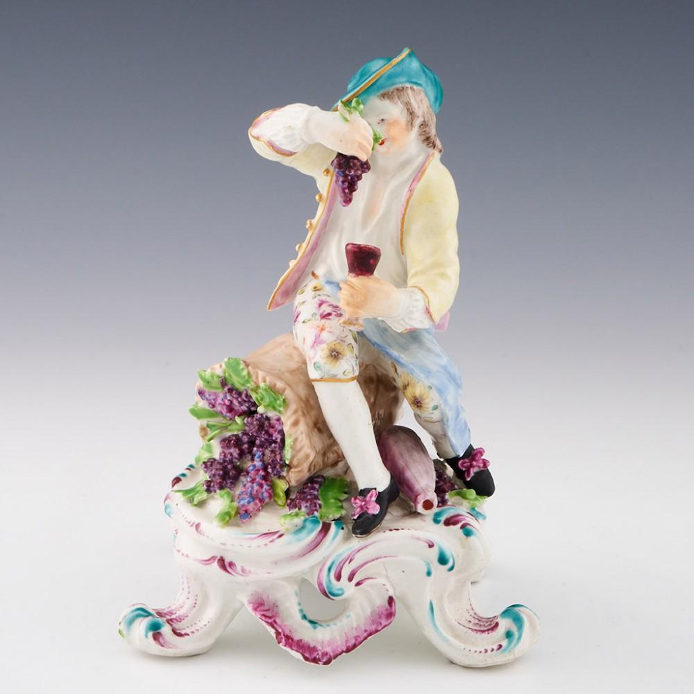 Bow Porcelain Figure - Seated Rustic Seasons - the Autumn Vendangeur, c1765

Additional information:
Date : c1765
Period : George III
Marks : none
Origin : Stratford at Bow; England
Colour : Polychrome with gilt highlights
Pattern : The Autumn