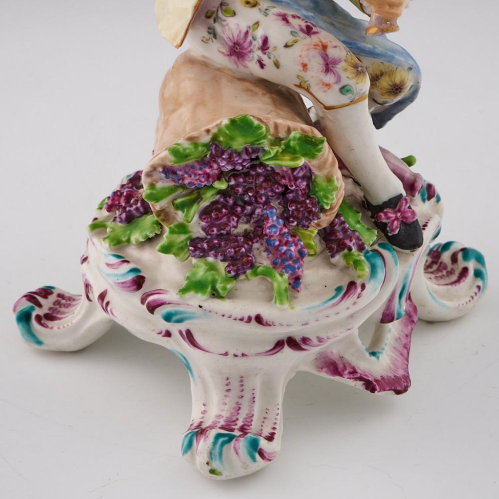 18th Century and Earlier Bow Porcelain Figure - Seated Rustic Seasons - the Autumn Vendangeur, c1765 For Sale