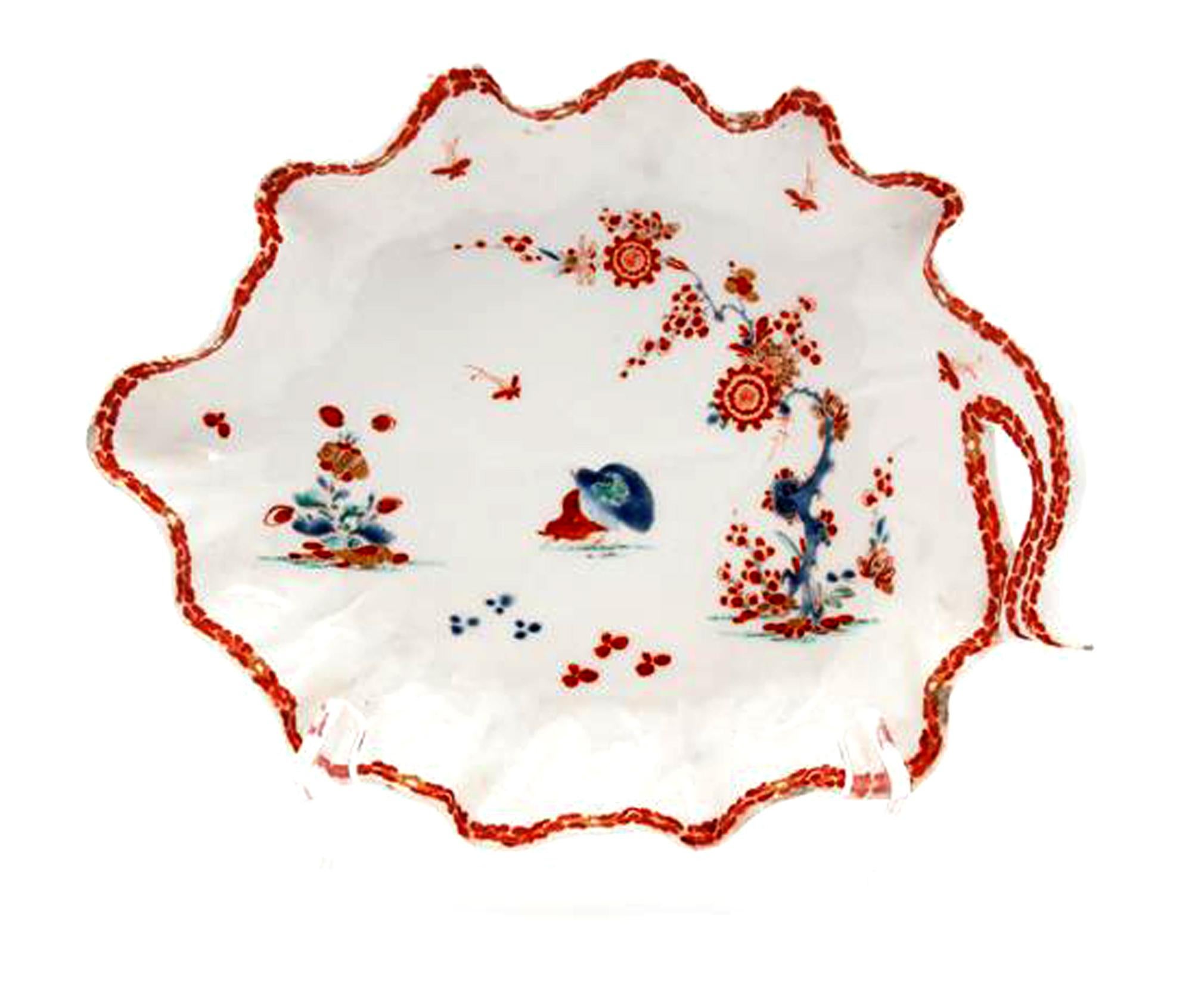 Bow Porcelain Kakiemon-style Double Quail pattern cabbage leaf dish, 
circa 1758-1760.
(NY9029)

The large Bow porcelain dish is painted with the Double Quail pattern in the Kakiemon style of colouration using principally orange. The dish with a