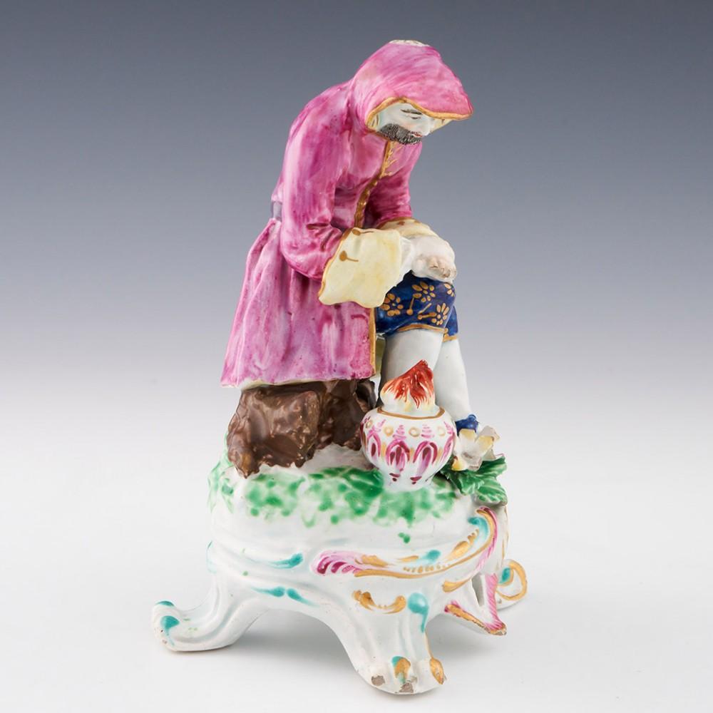 Bow Porcelain Seated Rustic Seasons Figure of Winter, c1765

Additional information:
Date : c1765
Period : George III
Marks : None
Origin : New Canton factory, Bow, London, England
Colour : Mauve coat with yellow lining, and blue breeches;
