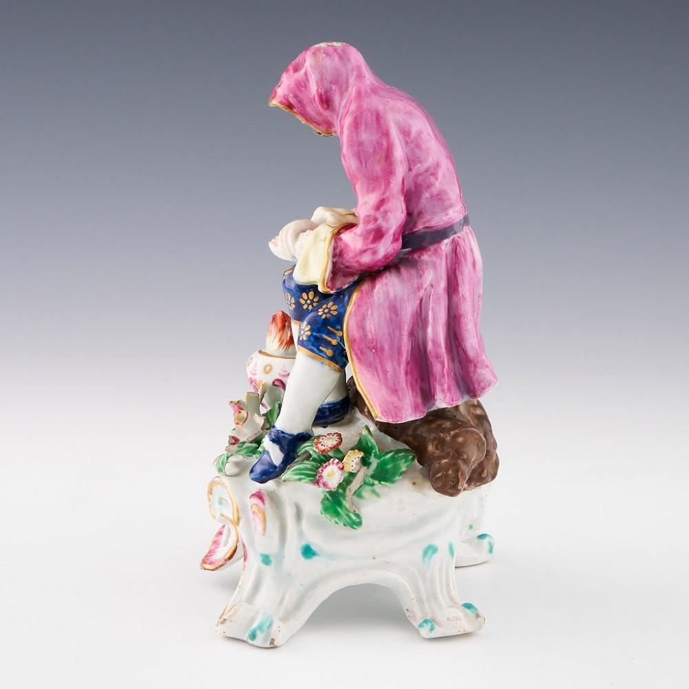 Bow Porcelain Seated Rustic Seasons Figure of Winter, c1765 In Good Condition For Sale In Tunbridge Wells, GB
