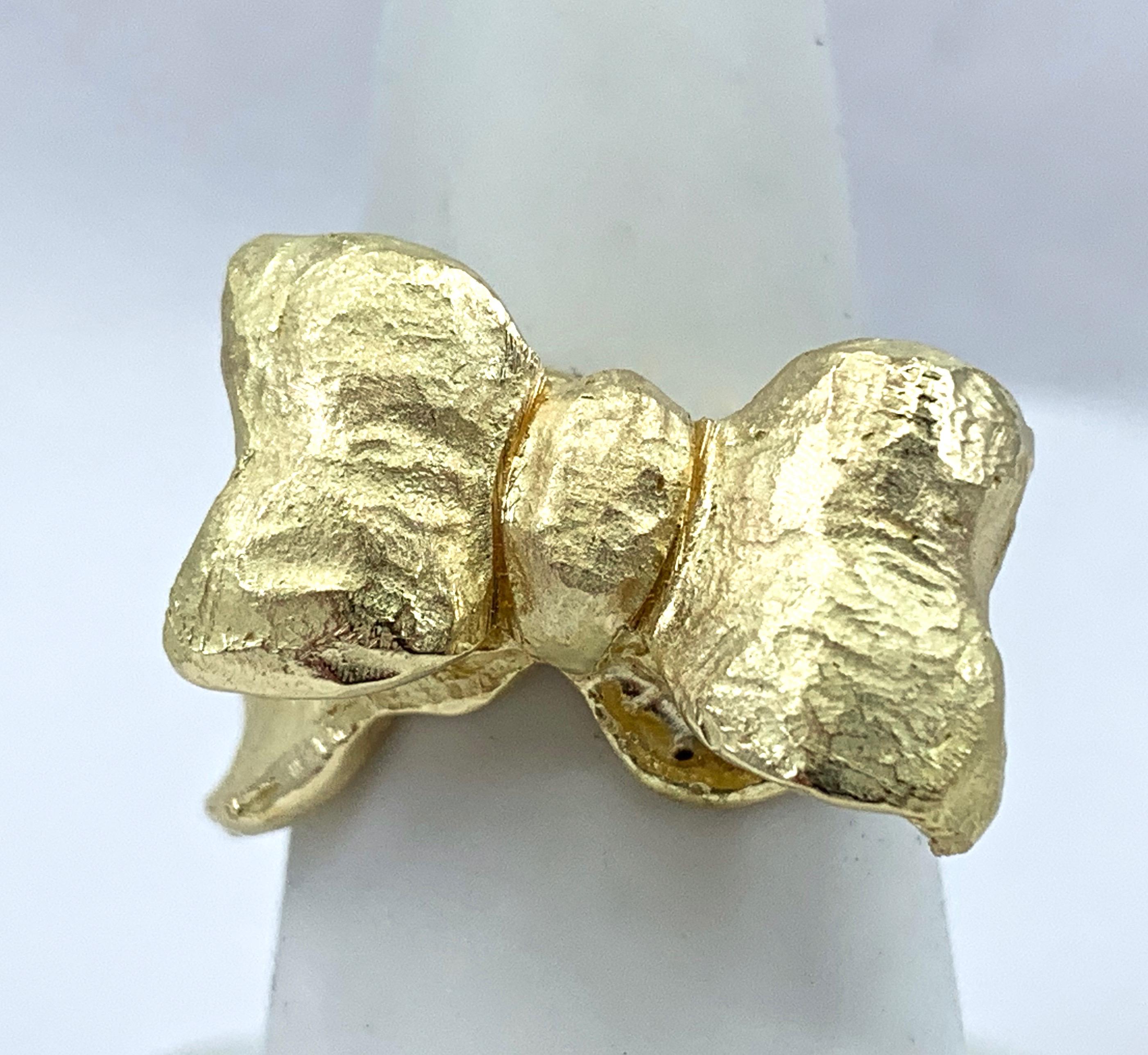 Eytan Brandes designed this fun, oversized and flattering ring in our shop and crafted it using a hand-sculpted wax mold.  It's one-of-a-kind and features a glossy satin finish with polished edges to add depth and definition.

Just like a real bow,