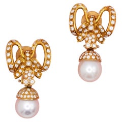 Bow shaped clip on earrings - 18k solid yellow gold - 2.45 ct diamonds & pearl