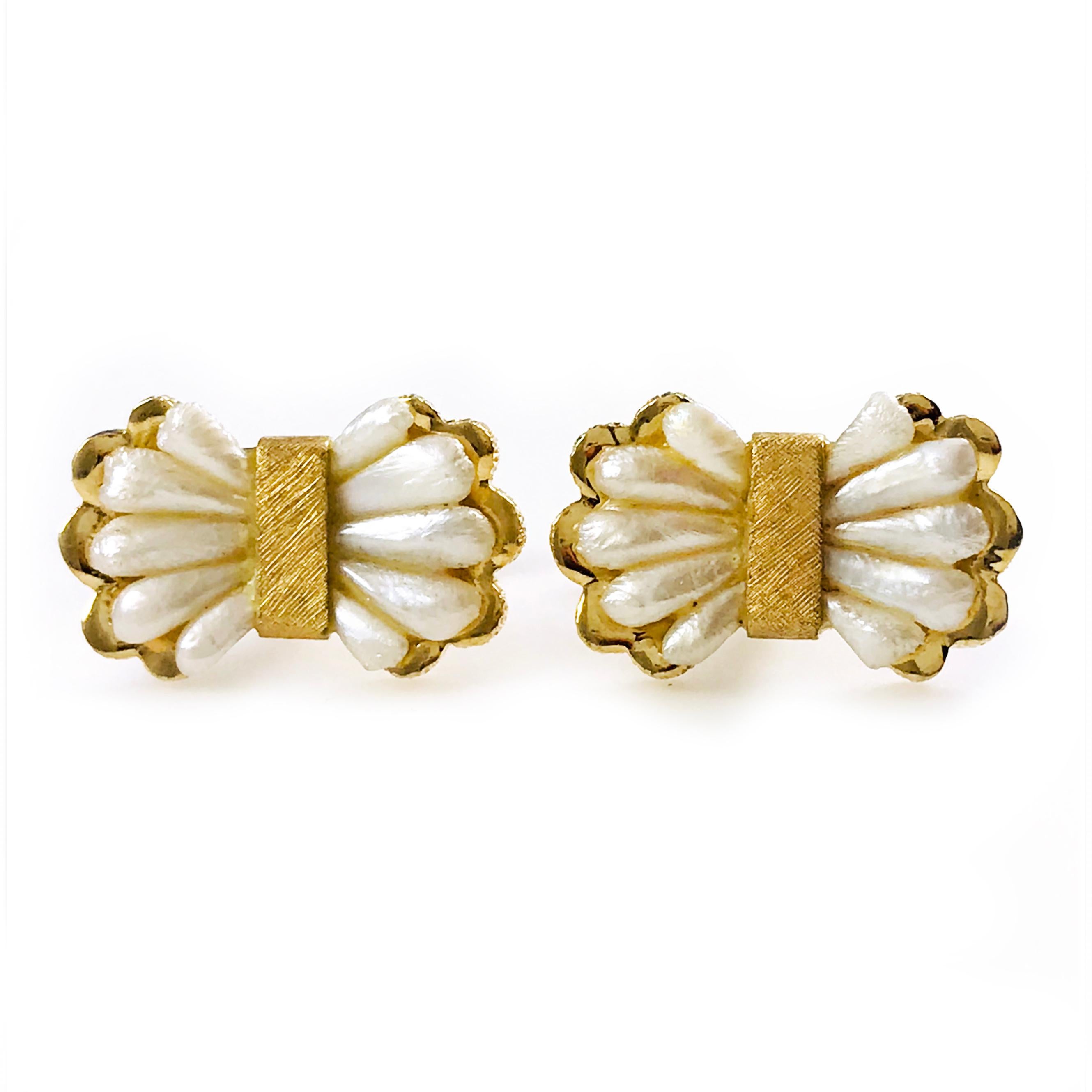 Bow-Shaped Biwa Pearl 14K Gold Cufflinks. The cufflink fronts are bow-shaped with five seashell-like sections on both sides and a gold center. There are three finishes present on these unique cufflinks, bark finish on the gold surround, Florentine