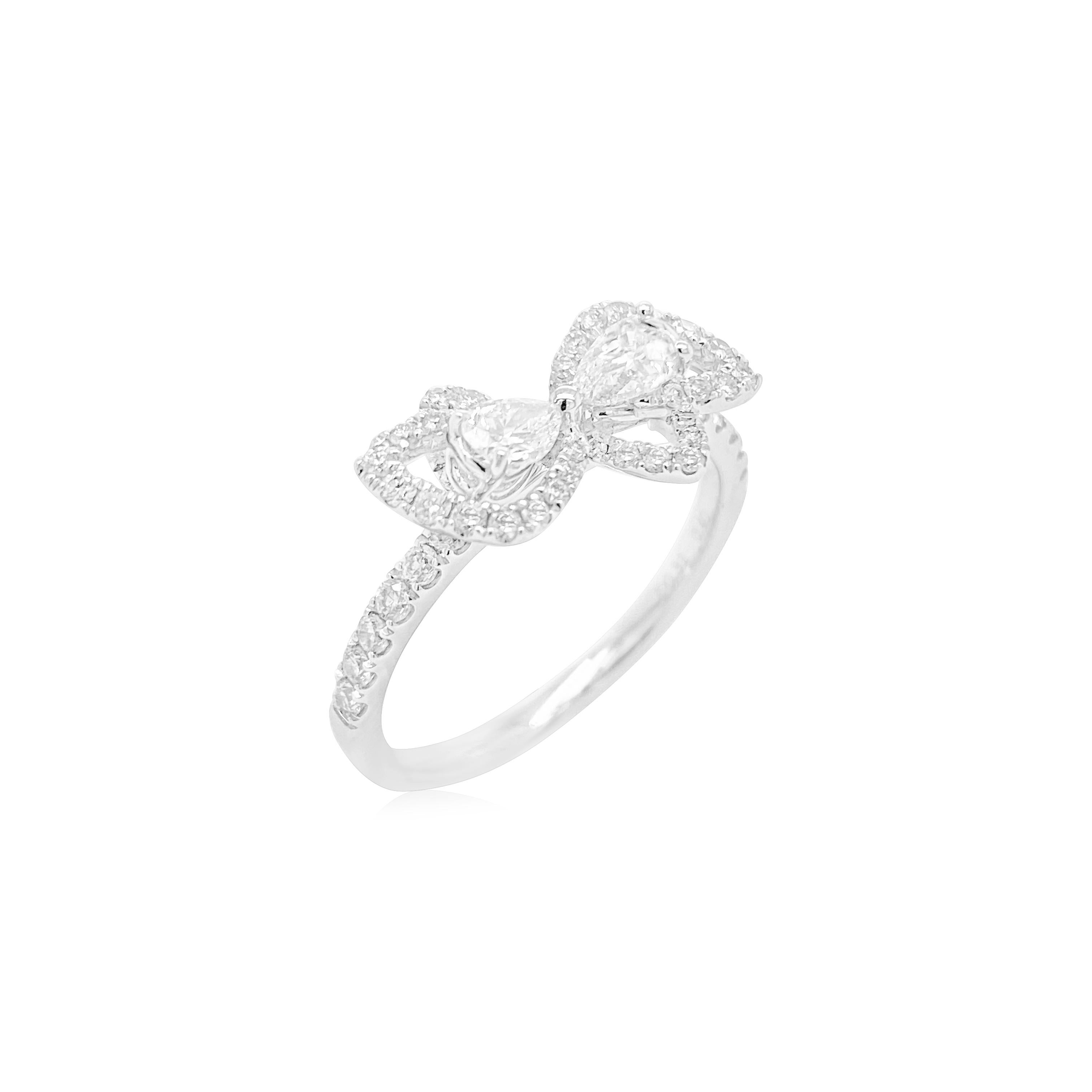 This beautiful ring in the shape of a bow is styled with Natural White Pear Shape diamonds, a unique design for a special occasion.

Center White Diamonds - 0.31 CT
White Diamonds - 0.40 CT
Made in Platinum

HYT Jewelry is a privately owned company