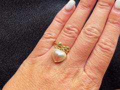 Bow Tie and Dangly Heart Shaped Mabe Pearl Ring in 14K Yellow Gold