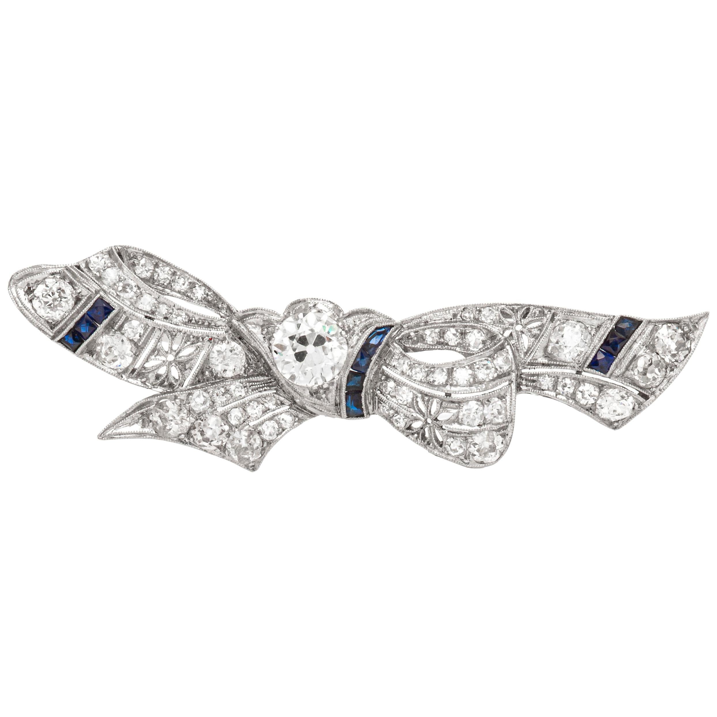 Bow Tie Platinum with Diamonds and Synthetic Sapphire Brooch