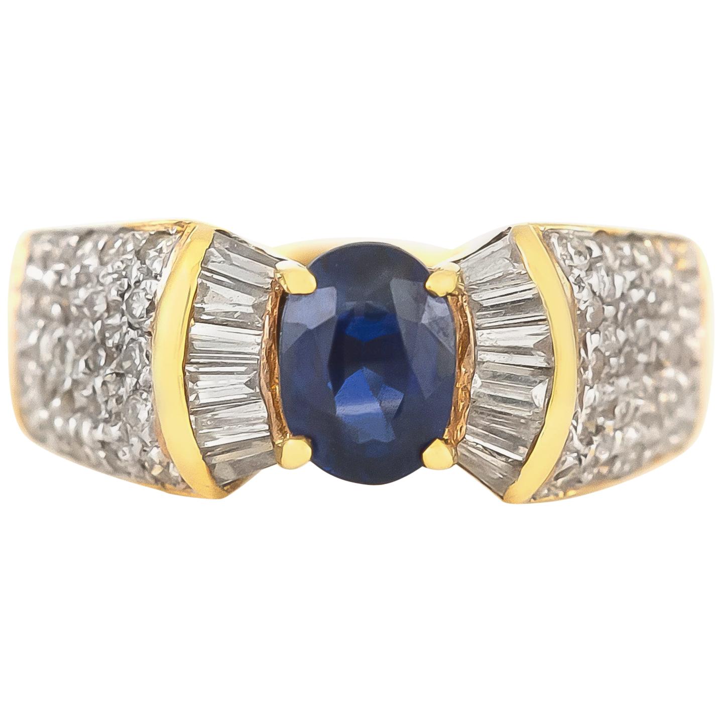 Bow Tie Style with Center Sapphire and Diamonds Around Ring