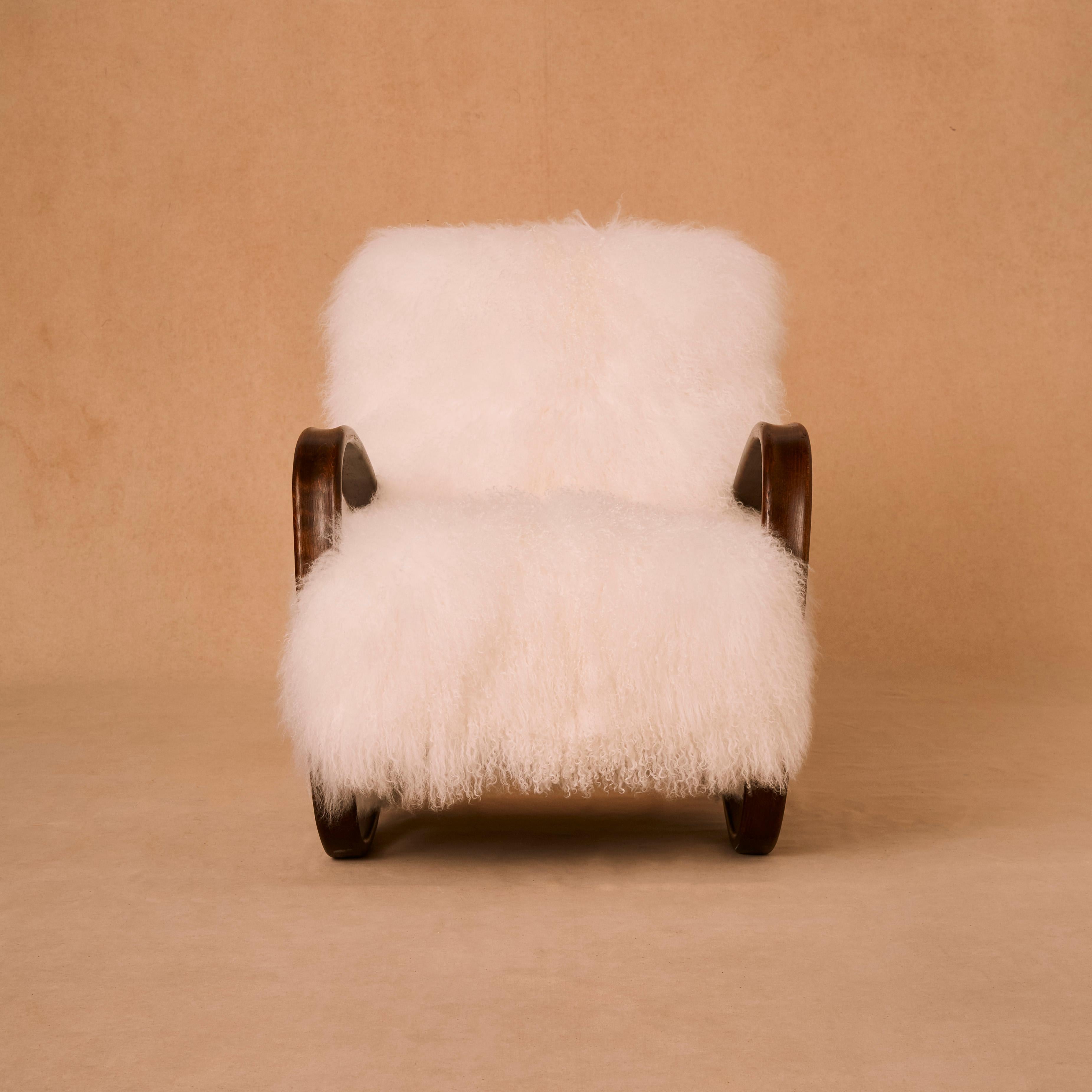 Late 20th Century Bow Wood Chair with Sheepskin by Jindřich Halabala For Sale