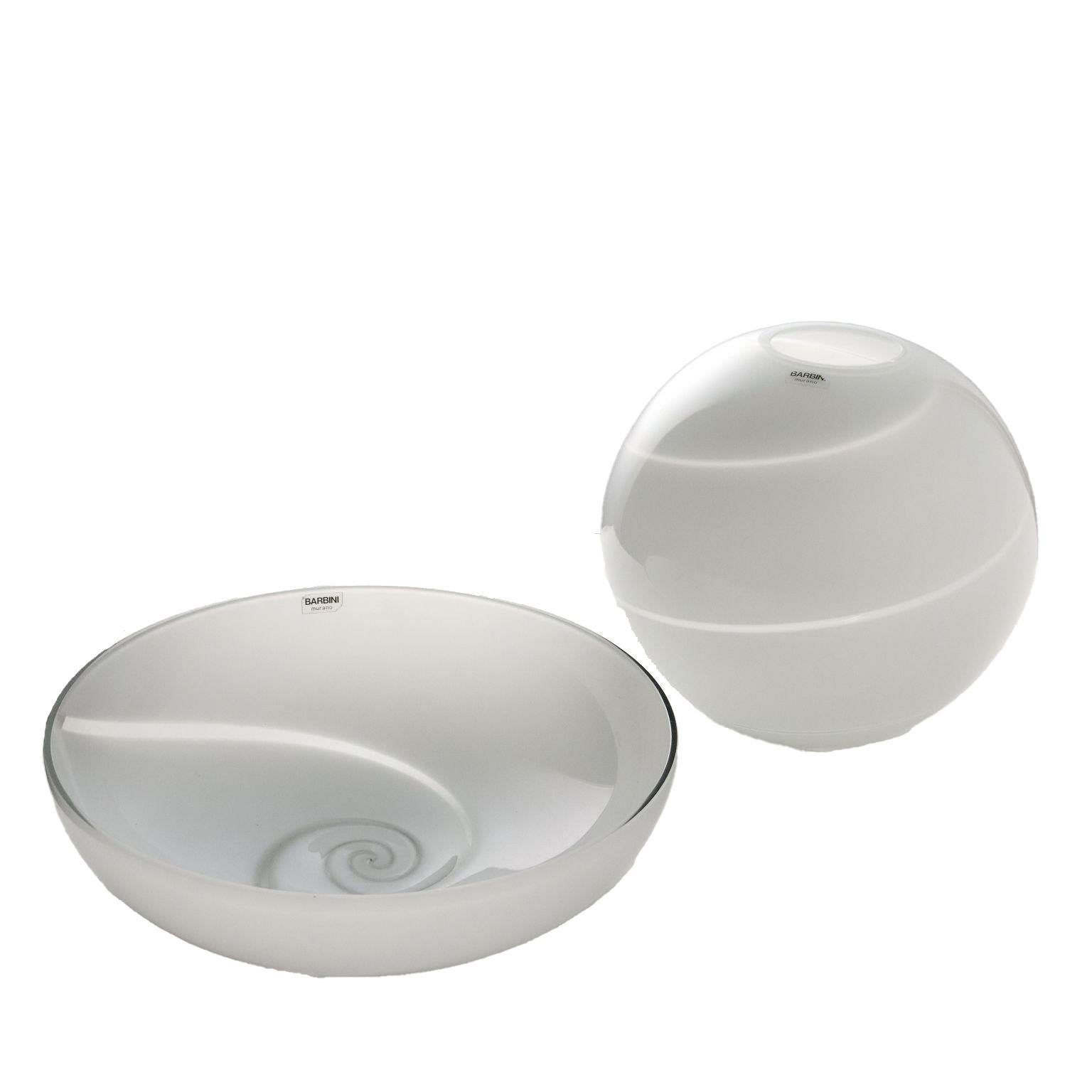 Bowl and sphere vase in colorless and milk glass. Manufacture adhesive label and pointed signature under the base of the bowl.