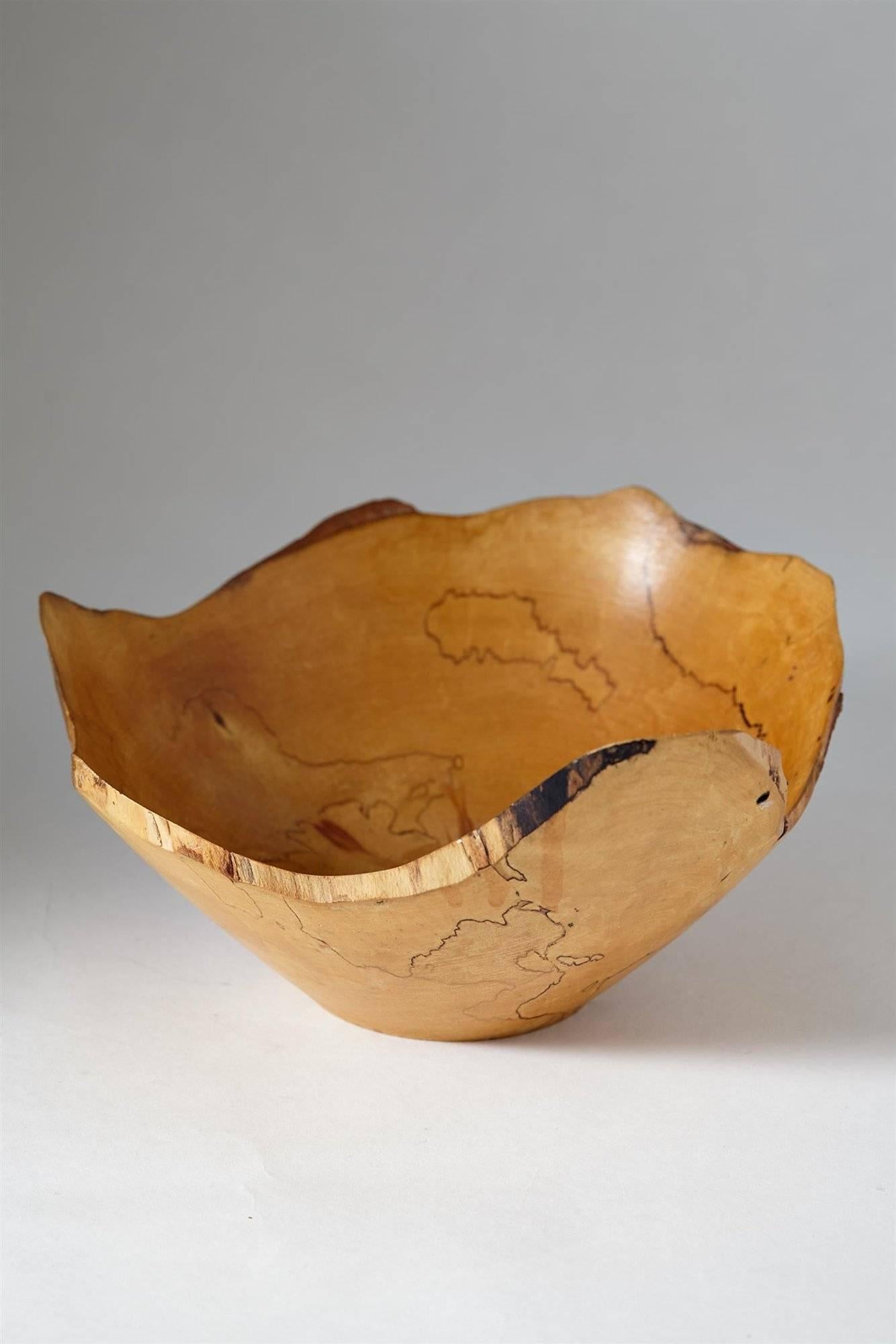 Bowl by Jonny Mattsson, Sweden, 1950s.

Karelian birch.

Measures: H 13 cm/ 5''
L 26 cm/ 10 1/4''.