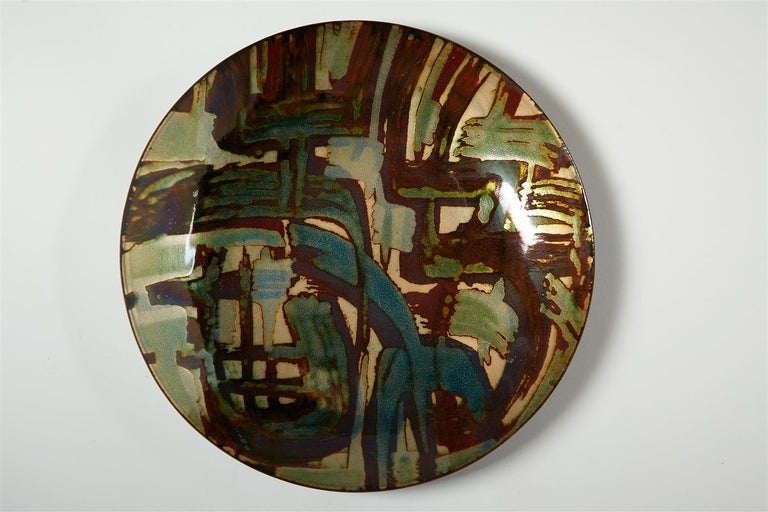 Glass enamel on copper.

Measures: H 4 cm/ 1 ½”
D 29 cm/ 11 ½”.