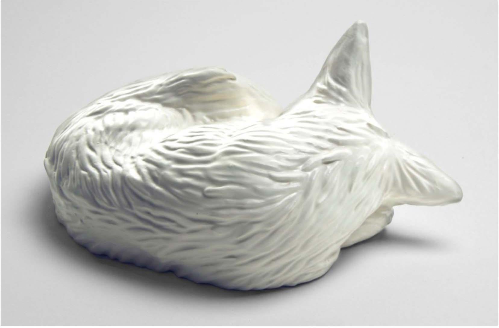 Bowl II: Dingo is made from slip-cast porcelain with a white satin glaze and 22K gold luster. It is part of the The Lost Camp's Black Apollo Island Series. 

This two-sided statement piece is sculpture of a sleeping dingo on one side, but when