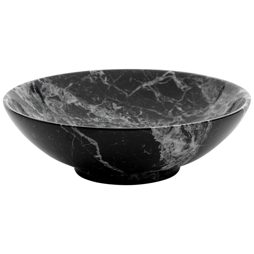 Fruit bowl in black Marquina marble ideal for fruit and to present food. Each piece is in a way unique (every marble block is different in veins and shades) and handmade by Italian artisans specialized over generations in processing marble. Slight