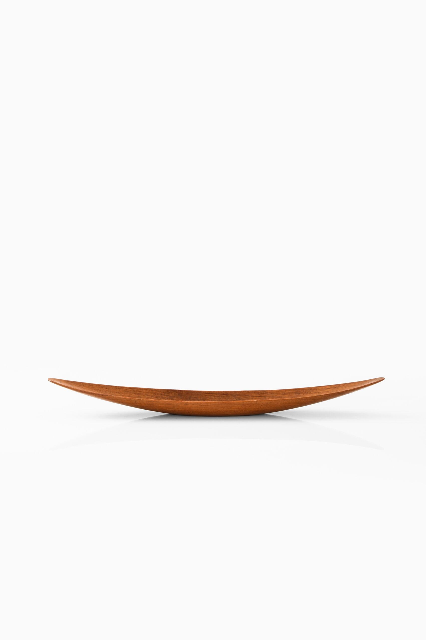 Large decorative bowl in teak by unknown designer. Produced in Sweden.