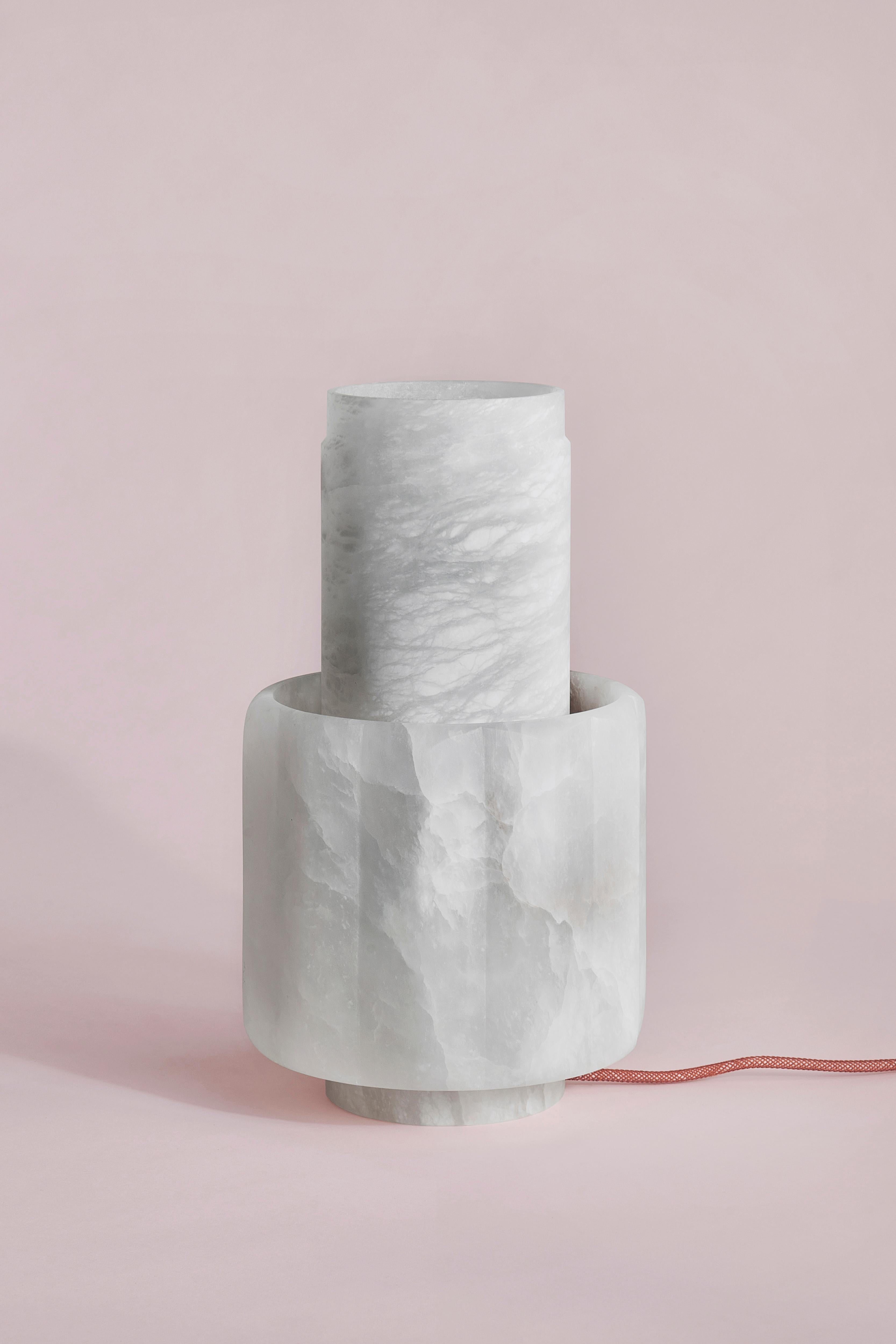 Bowl Table Lamp by SB26
Dimensions: W 38 x D 38 x H 21 cm
Materials: Alabaster, LED Source.

In a consistently geometric vocabulary, this family of lamps unveils the
translucent and organic nature of alabaster.
A contrast of shapes and