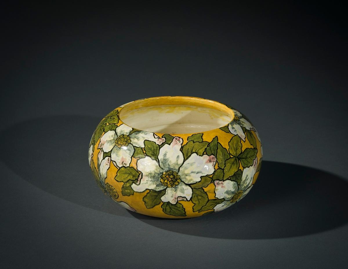 Bowl with Dogwood Blossoms, 1882
John Bennett (1840–1907)
Earthenware, painted and glazed
4 in. high, 7 5/8 in. diameter
Signed, dated, and inscribed (on the bottom): J B[monogram]ENNETT / N.Y. / 1882 / R

If the Herter Brothers was the most
