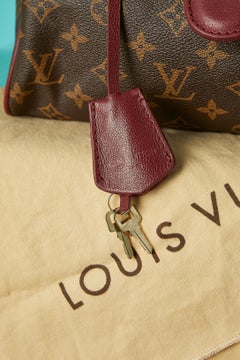 Bowling bag with monogram and burgundy leather Louis Vuitton 2011-2012