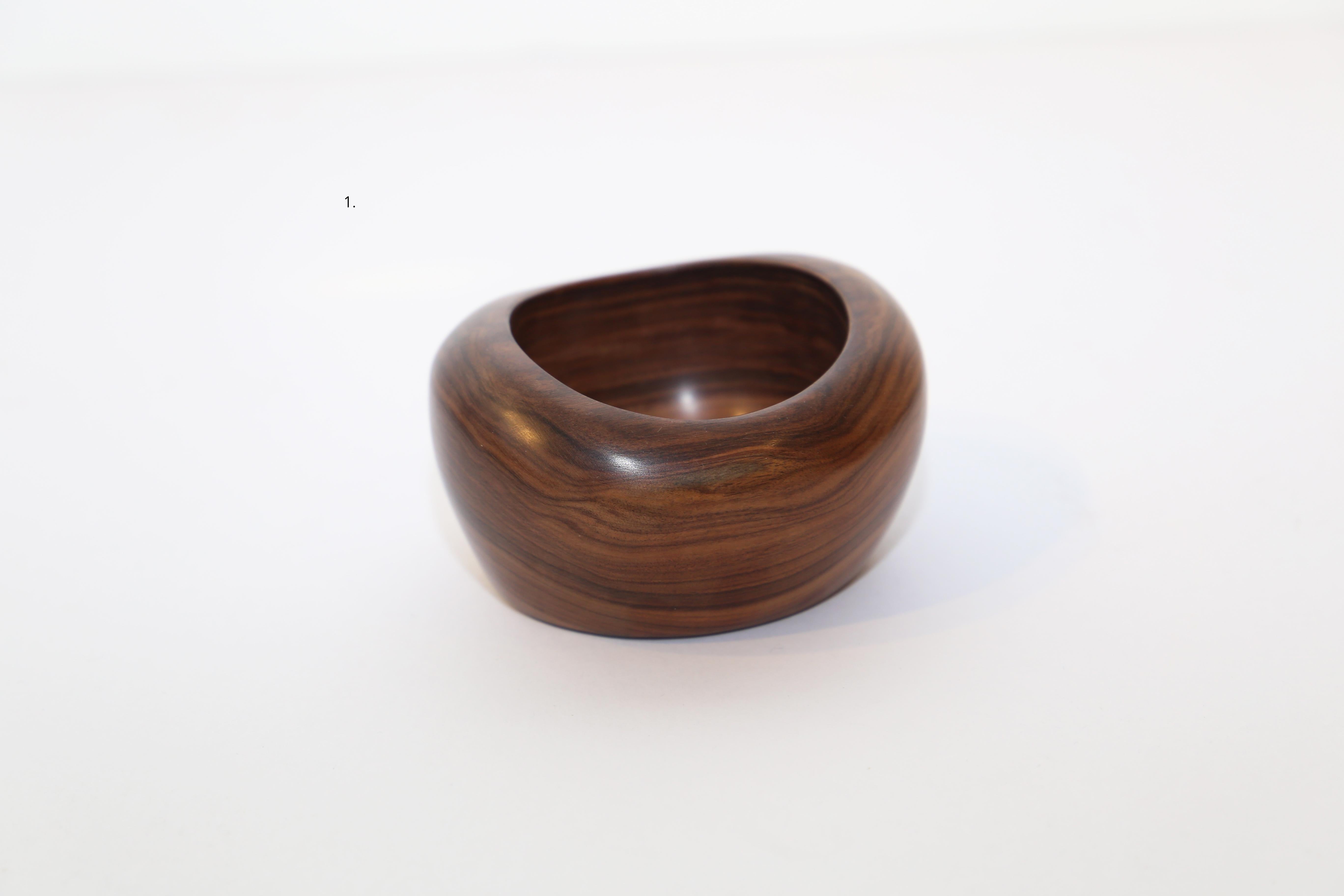Bowls set by Odile Noll in different types of wood 

1 . 'Coupe', Violet wood, 5.5 x 10 x 8 cm
2. 'Coupe', Bubinga wood, 4 x 9 x 7.5 cm
3. 'Coupe', Rosewood, 2 x 8 x 5.5 cm
4. 'Coupe', Rosewood, 3 x 16.5 x 7.5 cm
5. 'Coupe', Violet wood, 5 x