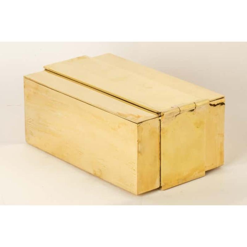 This box is hand-made in polished brass. Its gleaming surface reflects meticulous craftsmanship, making it a truly unique piece, blending both form and function in an exquisite way.  Not only is this box a functional storage solution, but it's also