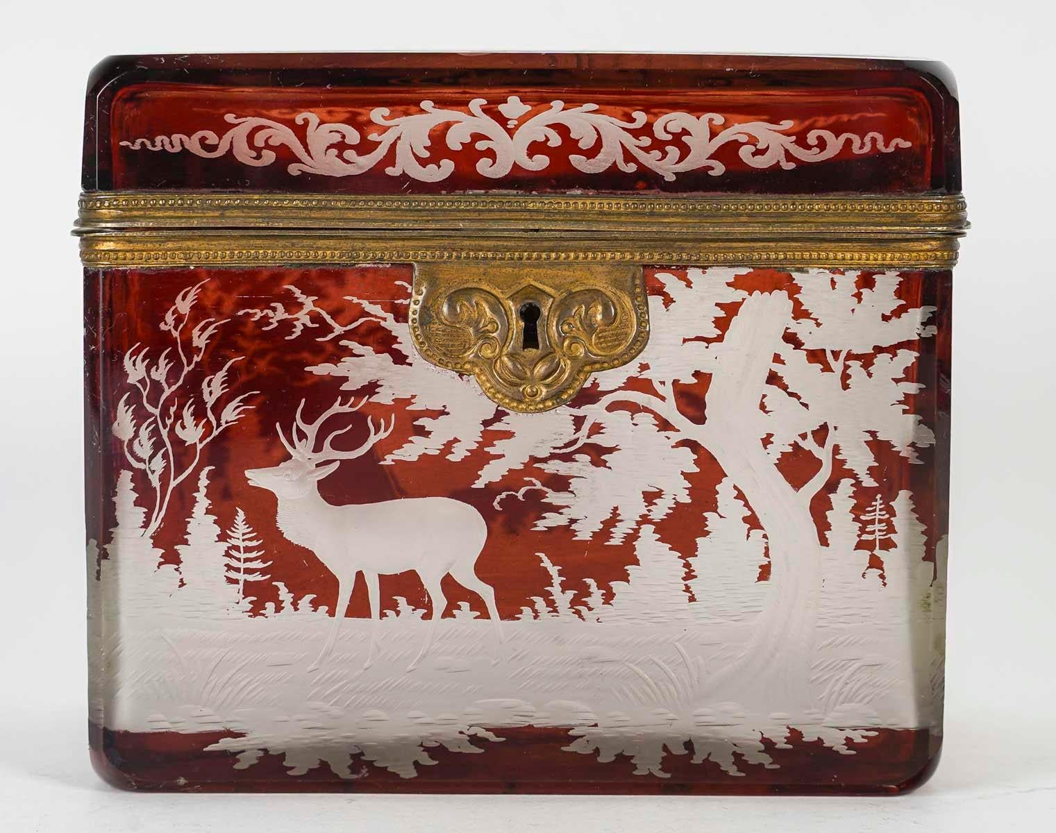 Box, Bohemian crystal box, 19th century, Napoleon III period.

Bohemian crystal box, brass mounting, 19th century, Napoleon III period.
h: 11.5cm, w: 13cm, d: 9cm