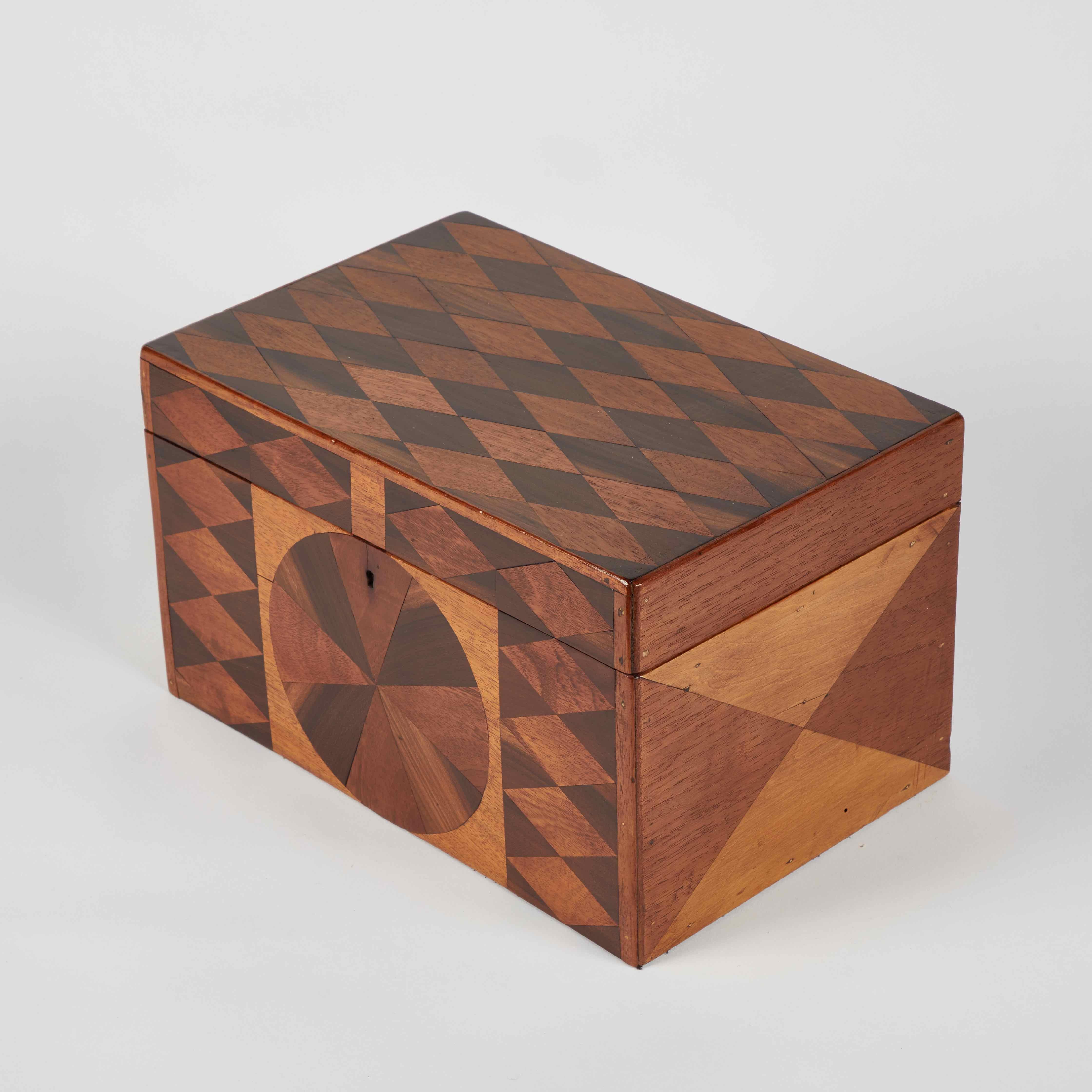 Parquetry box in boxwood and mahogany.