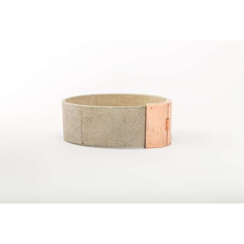 Choker in natural leather with brass clasp. Brass substrate is electroplated with 18k Rose Gold and then dipped into acid to create the subtly destroyed surface.