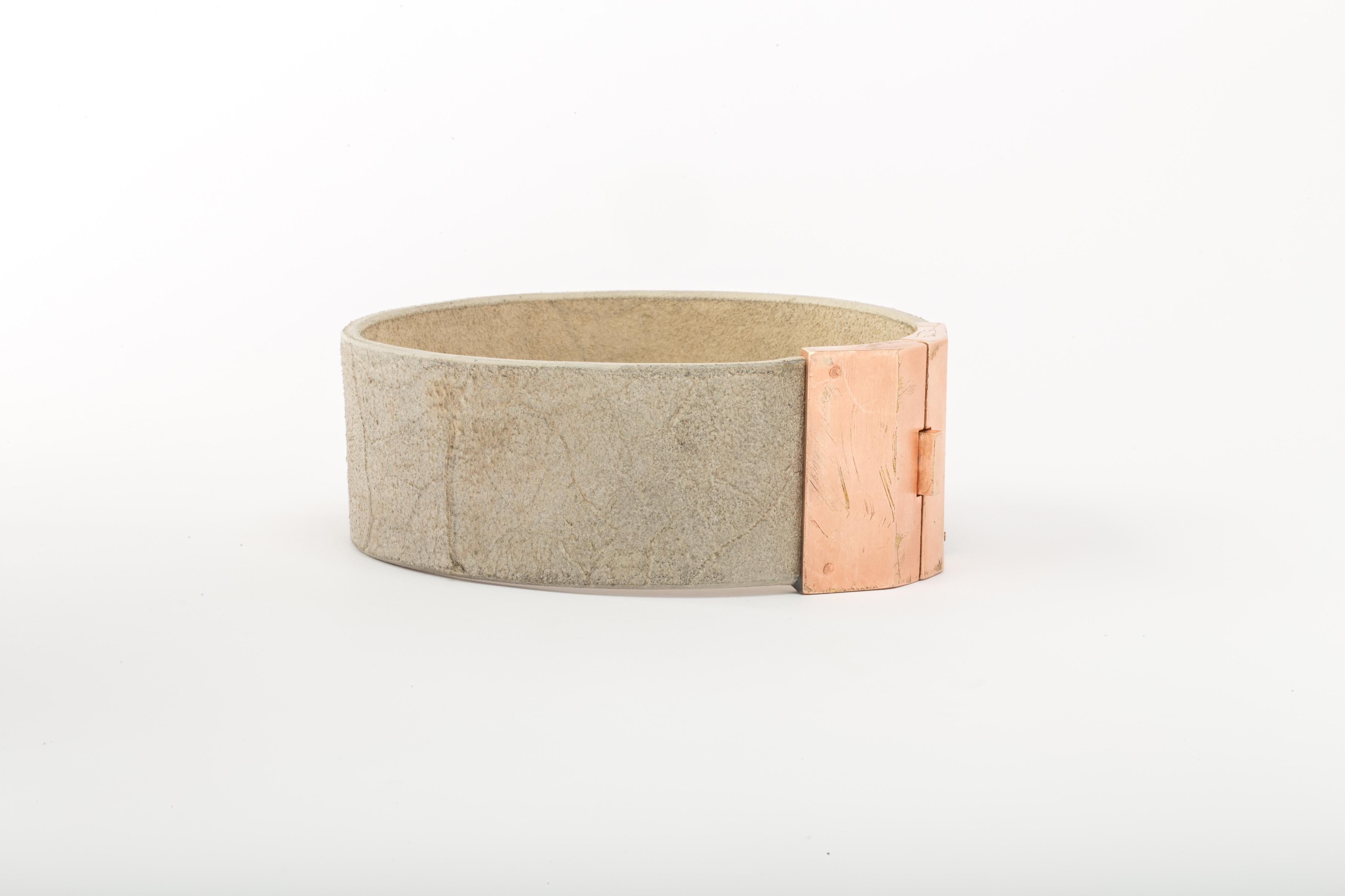 Choker in natural leather with brass clasp. Brass substrate is electroplated with 18k Rose Gold and then dipped into acid to create the subtly destroyed surface.