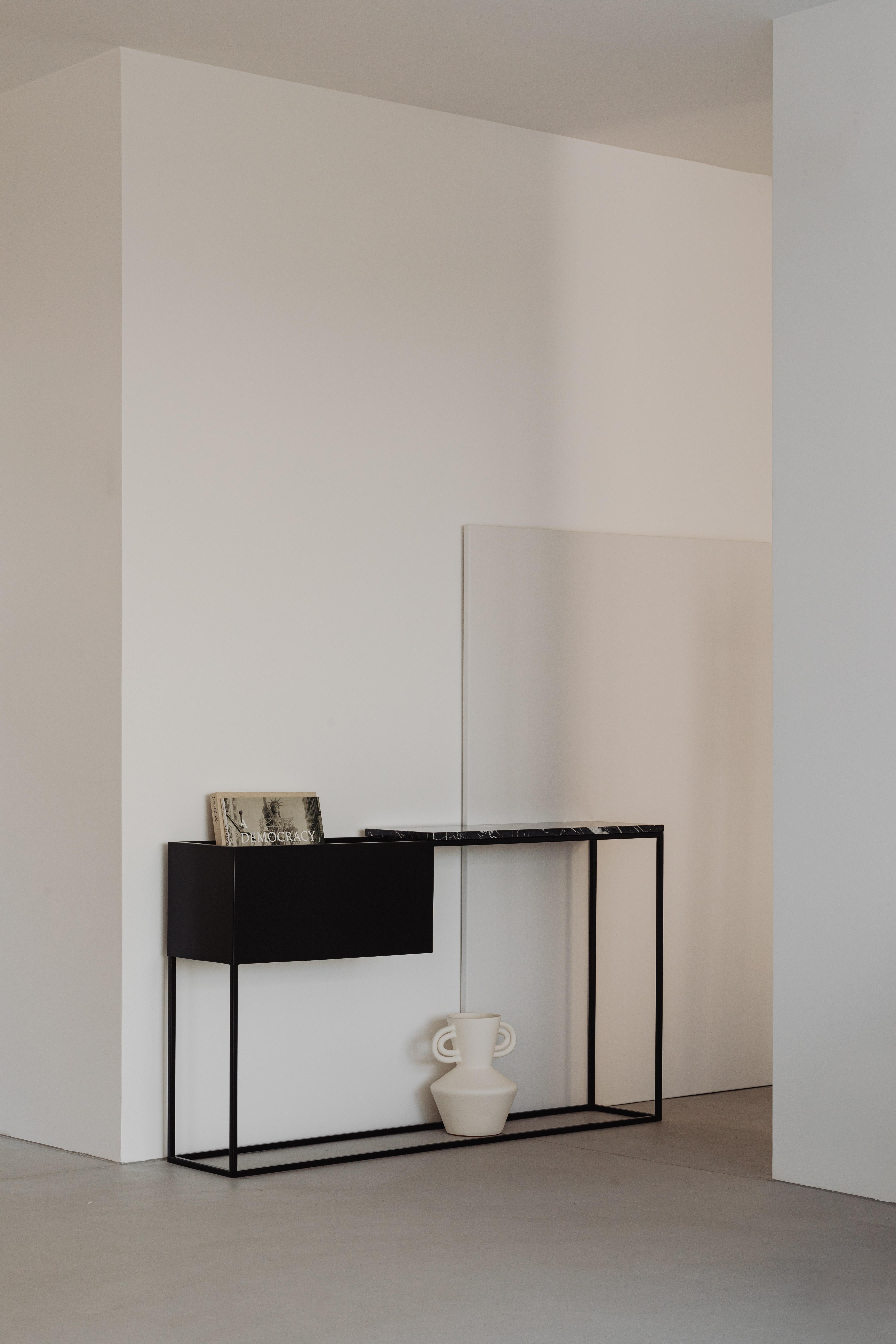 Box Maxi M Black Console Table by Un’common
Designed by Małgorzata Korycka.
Dimensions: D 28 x W 140 x H 80 cm.
Materials: Steel and Nero Marquina marble.

Available in different marble options. Please contact us.

BOX MAXI is a fine example of