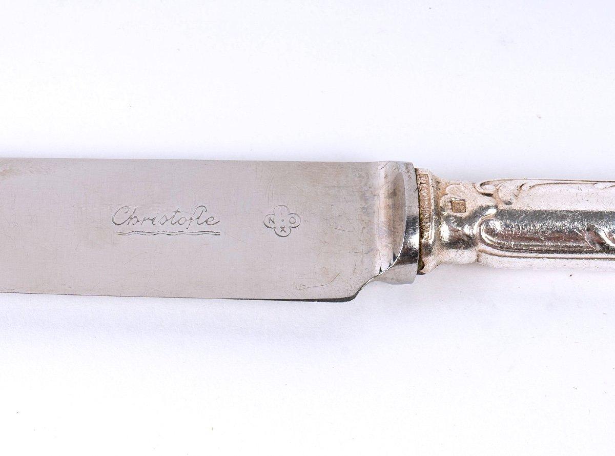 In their original box, twenty-four superb knives from the House of Christofle, the famous Louis XV chrysanthemum model 