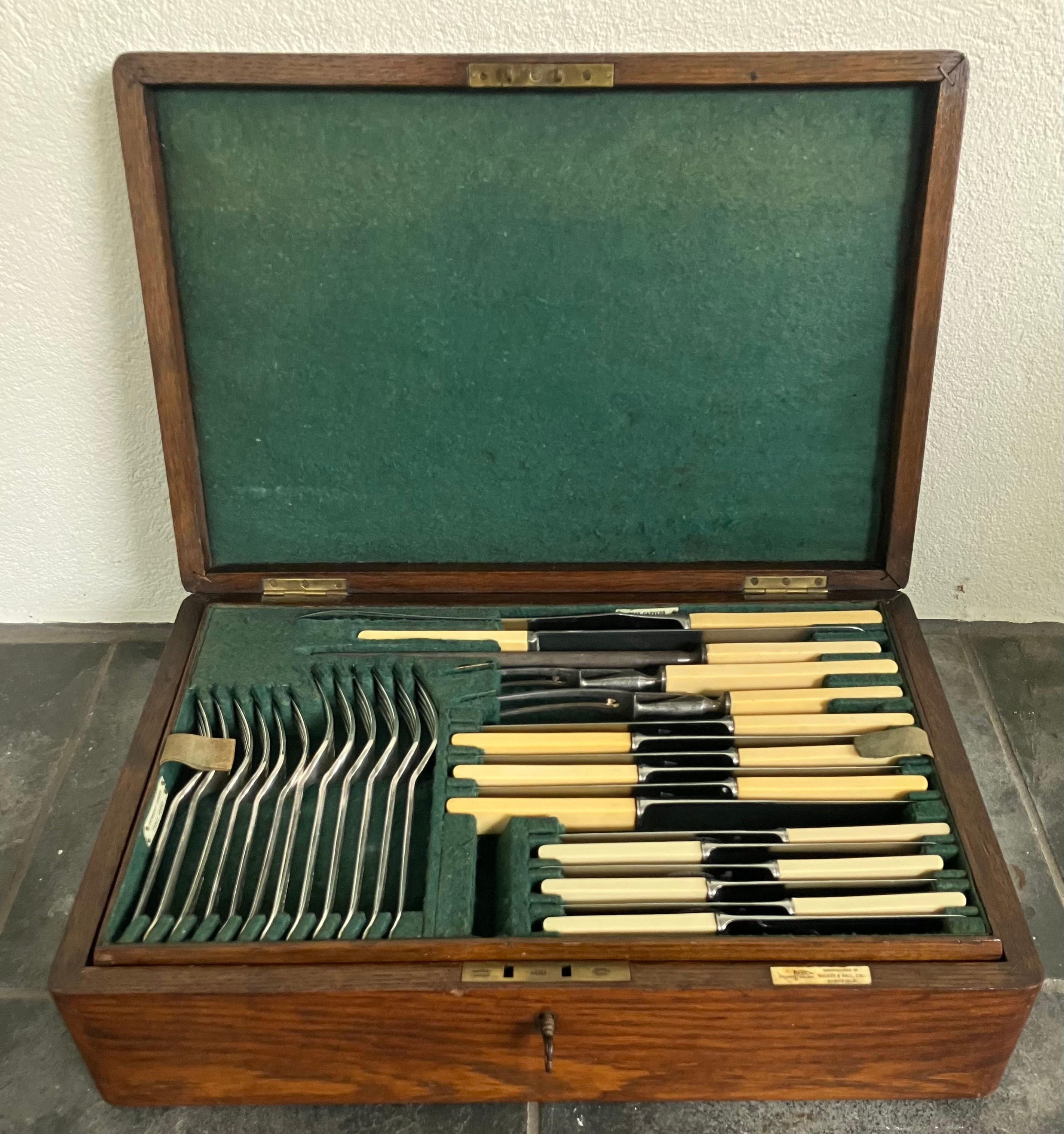 Boxed English Silver Serving Set for Six. Antique Sheffield Silver Plated Cutlery Set for Six retailed by Walker & Hall with accompanying serving pieces with stainless steel blades on all knives with Bakelite “horn” handles all in custom fitted