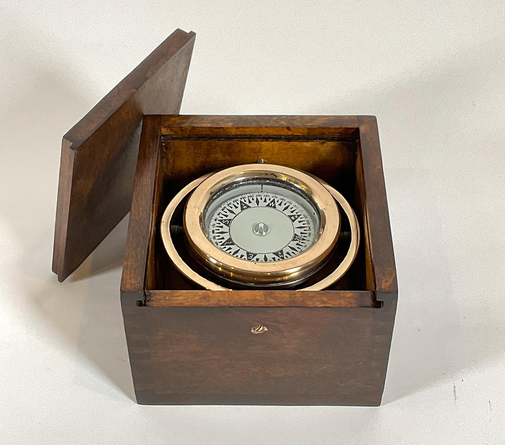 This classic marine instrument was made by Wilcox Crittendon of Middletown Connecticut. Solid brass marine compass fitted to a varnished wood box.

Weight: 2 LBS
Overall dimensions: 3